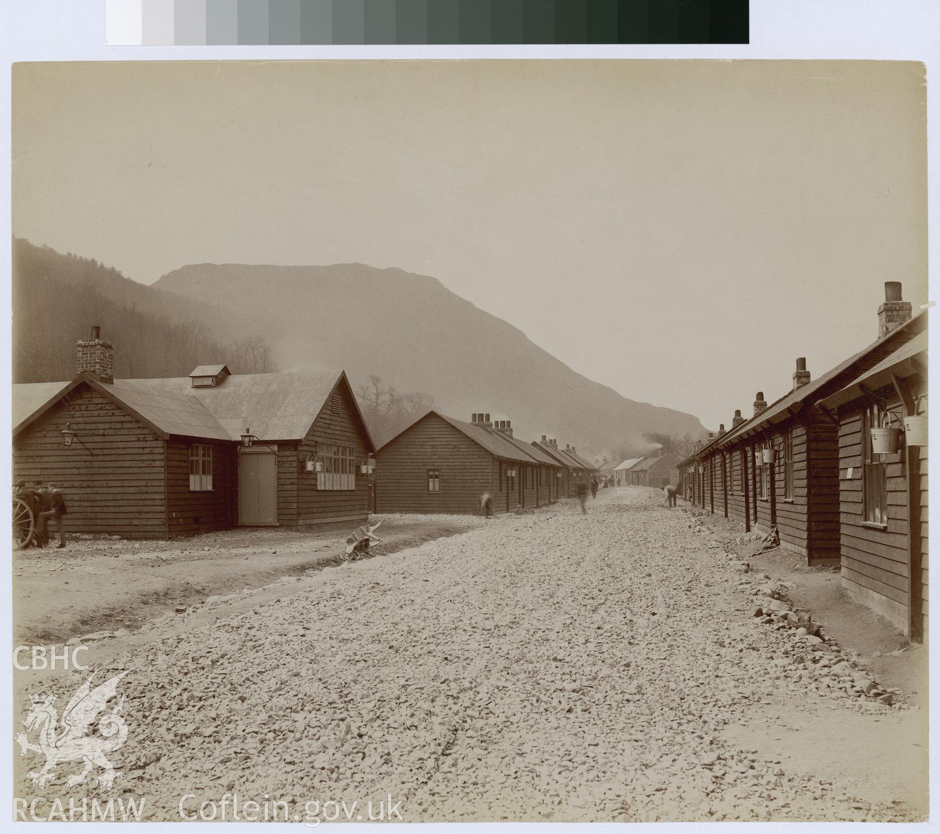 Digital copy of an albumen print from Edward Hubbard Collection showing main street and canteen looking upstream at the Elan Village.