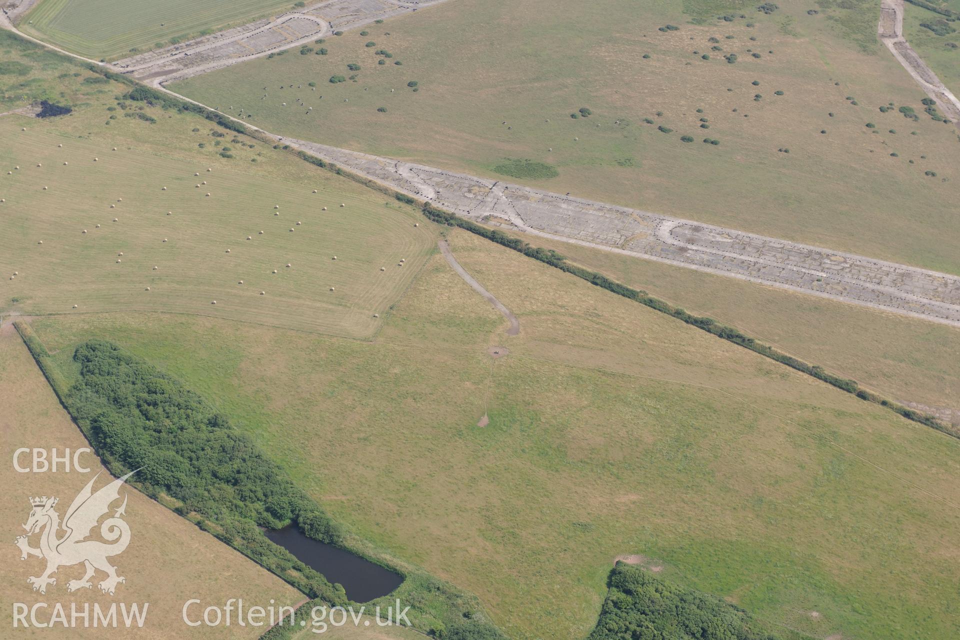 Uncertain cropmarks at Talbenny Airfield (SM 829 112). Oblique aerial photograph taken during the Royal Commission?s programme of archaeological aerial reconnaissance by Toby Driver on 16th July 2013.