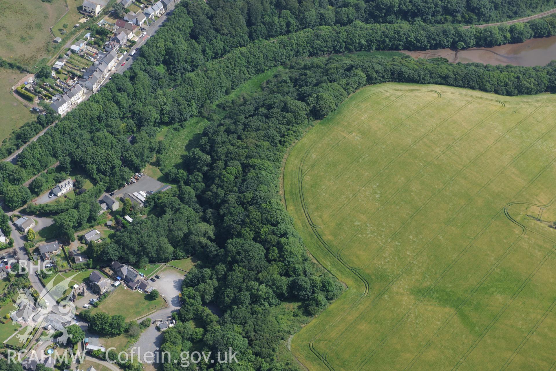 Priory of St Budoc and the Blessed Virgin, and Priory Farm, Milford Haven. Oblique aerial photograph taken during the Royal Commission?s programme of archaeological aerial reconnaissance by Toby Driver on 16th July 2013.