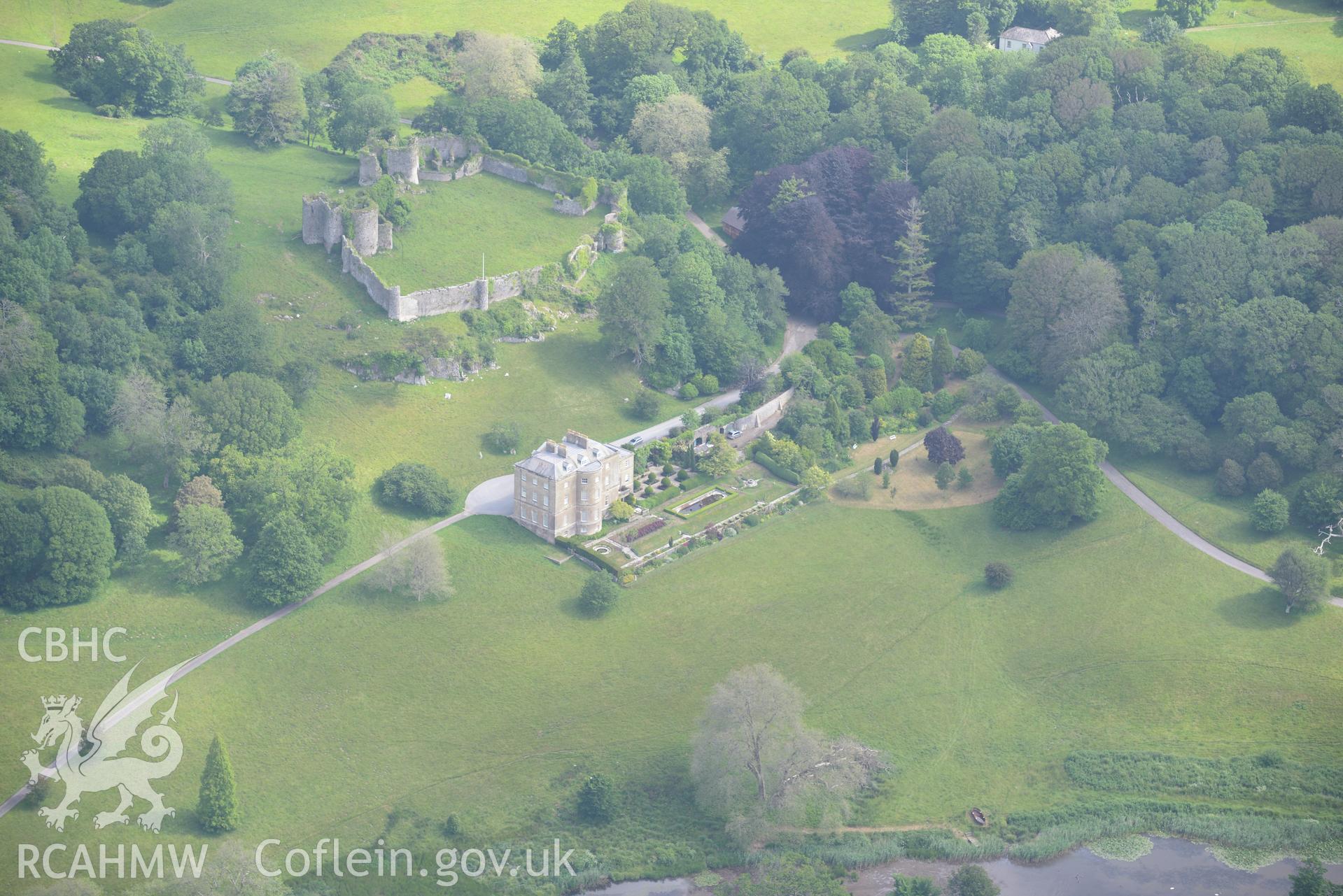 Penrice Castle, Mansion and Garden. Oblique aerial photograph taken during the Royal Commission's programme of archaeological aerial reconnaissance by Toby Driver on 19th June 2015.