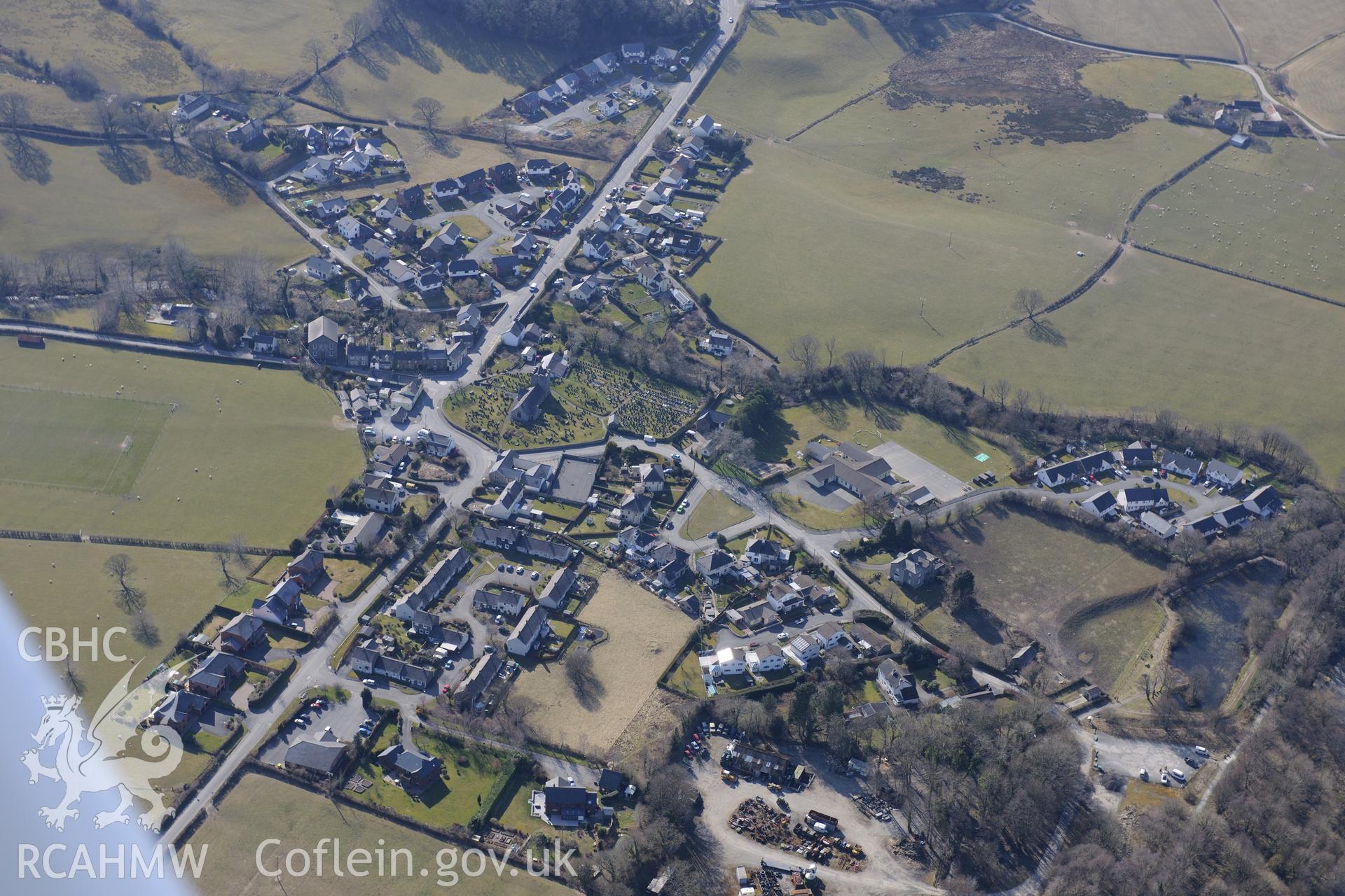 The village of Llanilar, south east of Aberystwyth, with St. Hilary's church at it's centre. Oblique aerial photograph taken during the Royal Commission?s programme of archaeological aerial reconnaissance by Toby Driver on 2nd April 2013.