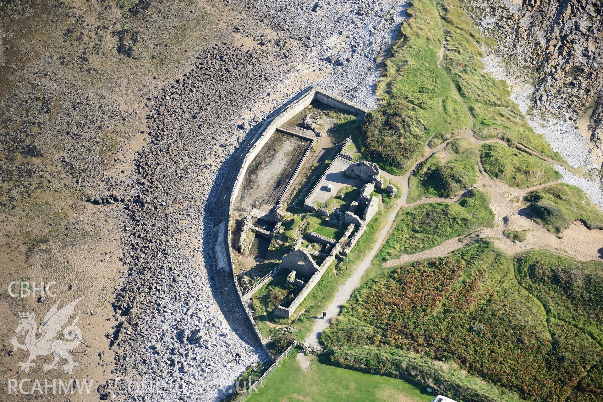 Port Eynon salt house, on the southern shores of the Gower Peninsula at Port Eynon Bay. Oblique aerial photograph taken during the Royal Commission's programme of archaeological aerial reconnaissance by Toby Driver on 30th September 2015.