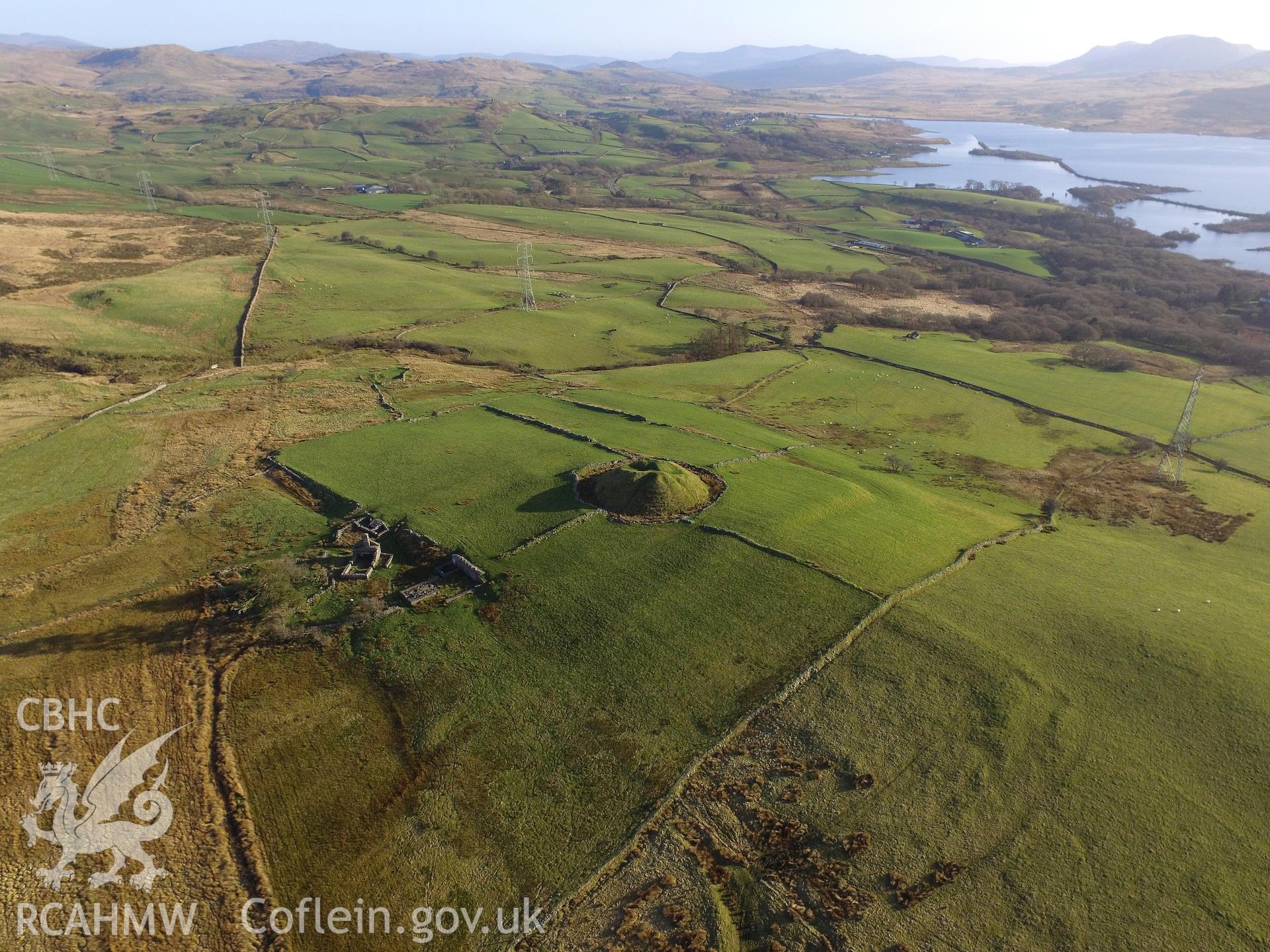 Aerial view from the north east of Tomen-y-Mur and Tomen-y-Mur farm, with Llyn Trawsfynydd beyond, Maentwrog. Colour photograph taken by Paul R. Davis on 15th March 2017.