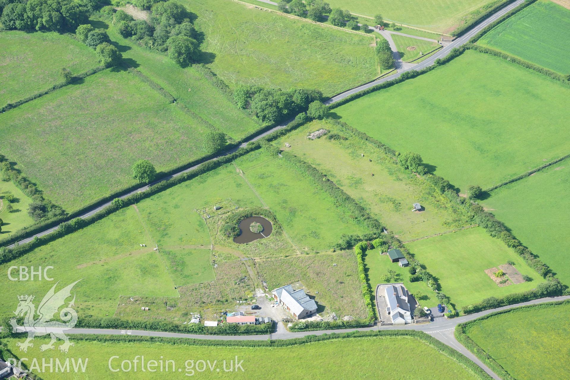 Standing stone west of Oldwalls. Oblique aerial photograph taken during the Royal Commission's programme of archaeological aerial reconnaissance by Toby Driver on 19th June 2015.