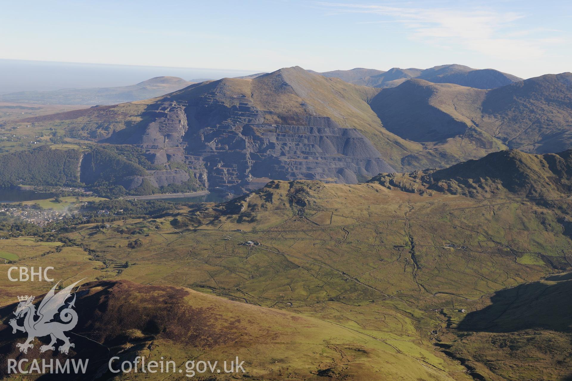 Dinorwic slate quarry and the town of Llanberis. Oblique aerial photograph taken during the Royal Commission's programme of archaeological aerial reconnaissance by Toby Driver on 2nd October 2015.