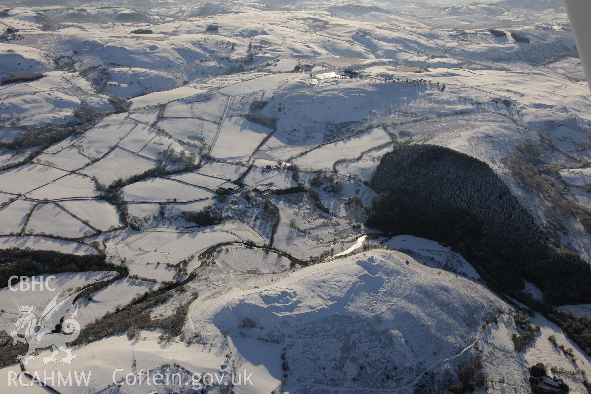 Cefnllys Castle, Penybont, east of Llandrindod Wells. Oblique aerial photograph taken during the Royal Commission?s programme of archaeological aerial reconnaissance by Toby Driver on 15th January 2013.