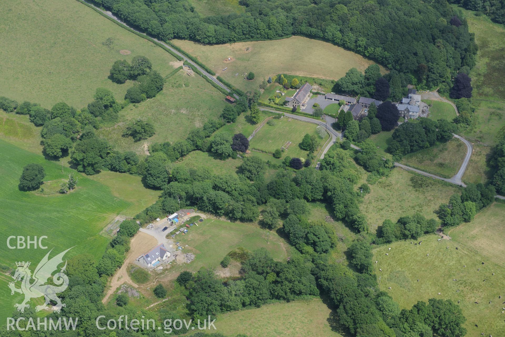 Whitland Abbey and Whitland Abbey House. Oblique aerial photograph taken during the Royal Commission?s programme of archaeological aerial reconnaissance by Toby Driver on 16th July 2013.