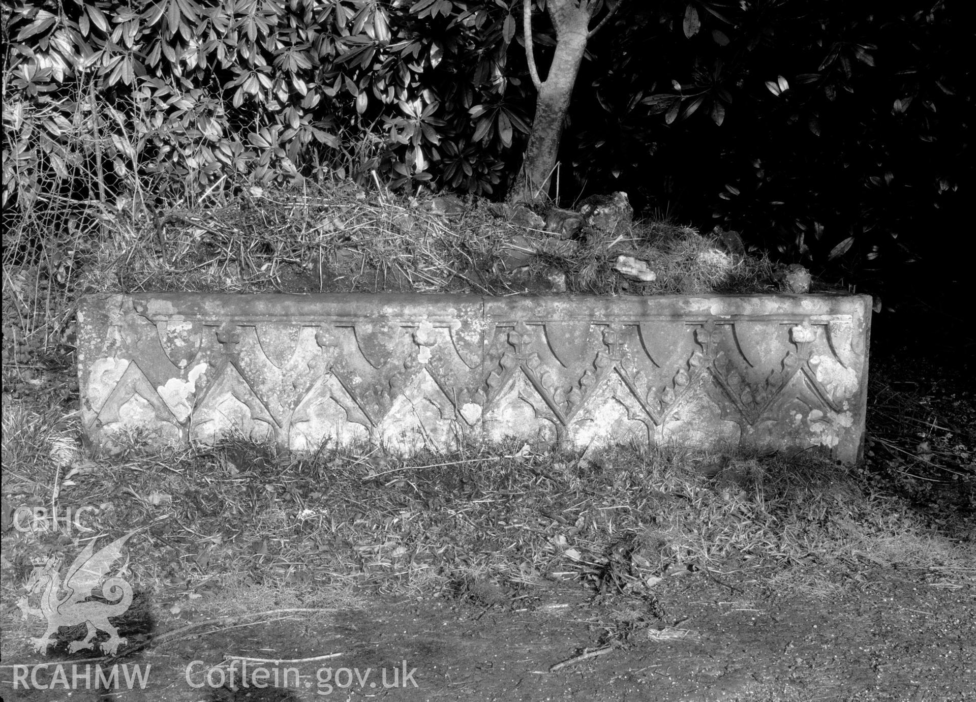 Digital copy of a nitrate negative showing inscribed stone at Downing Hall.