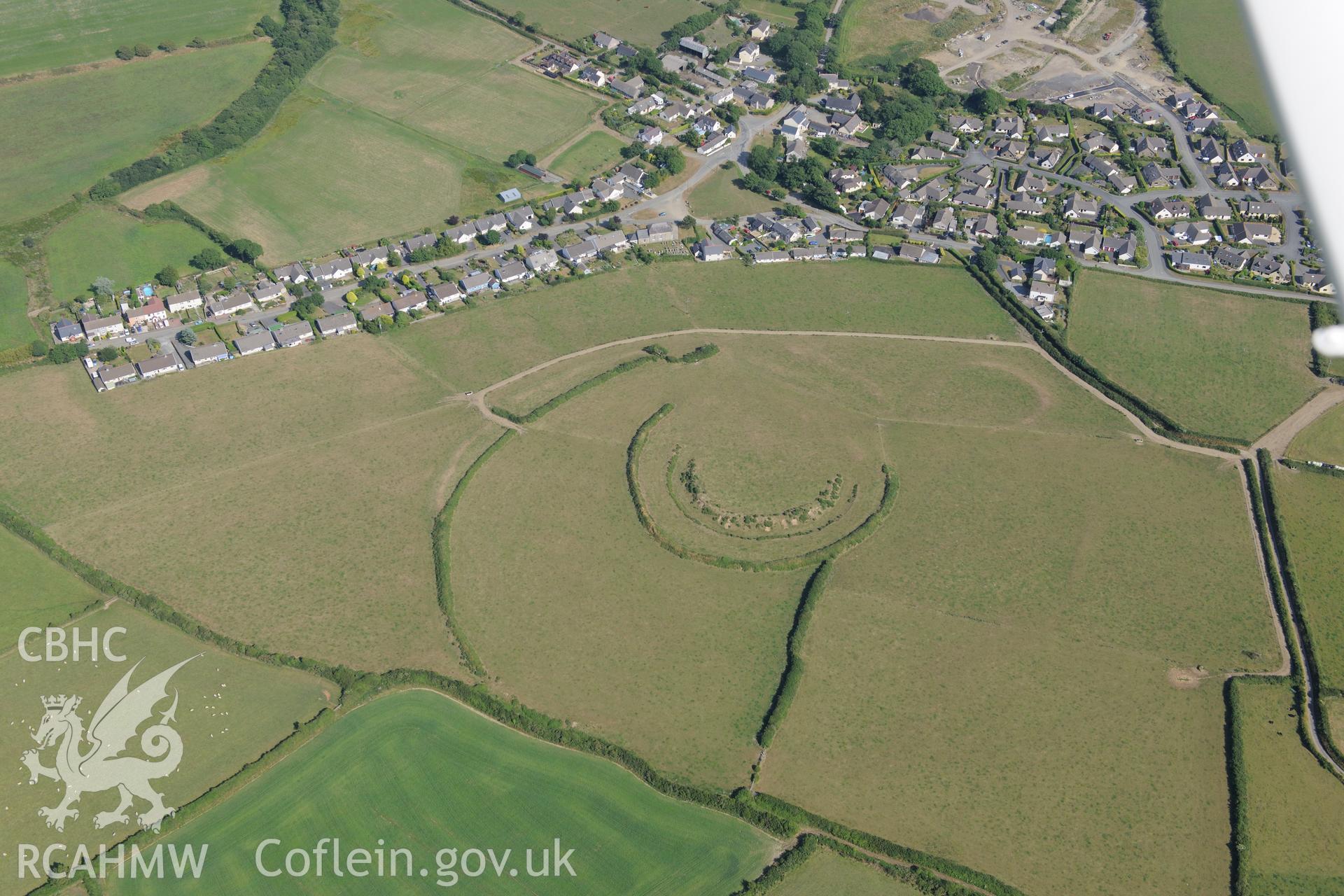 Keeston Castle hillfort, north west of Haverford West. Oblique aerial photograph taken during the Royal Commission?s programme of archaeological aerial reconnaissance by Toby Driver on 16th July 2013.