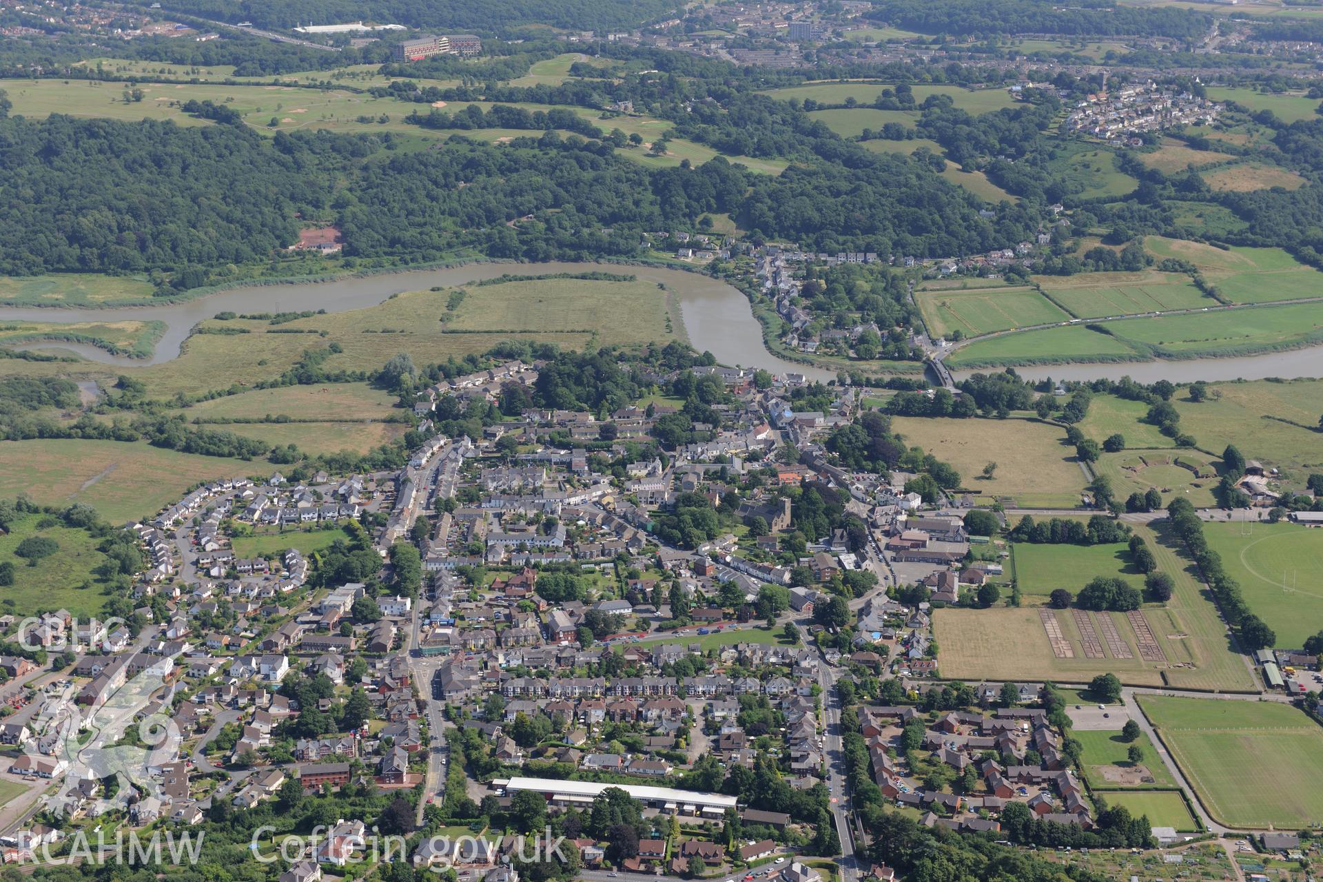 Roman barracks in Prysg Field, Roman parade ground in area under Broadway playing fields, and the town of Caerleon, north east of Newport. Oblique aerial photograph taken during the Royal Commission?s programme of archaeological aerial reconnaissance by Toby Driver on 1st August 2013.