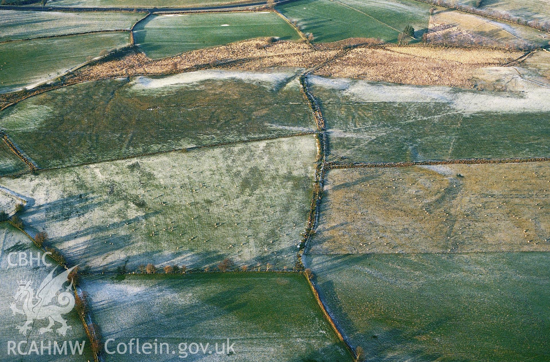 RCAHMW colour slide oblique aerial photograph of Caerau Roman Site, Treflys, taken on 11/01/1992 by CR Musson