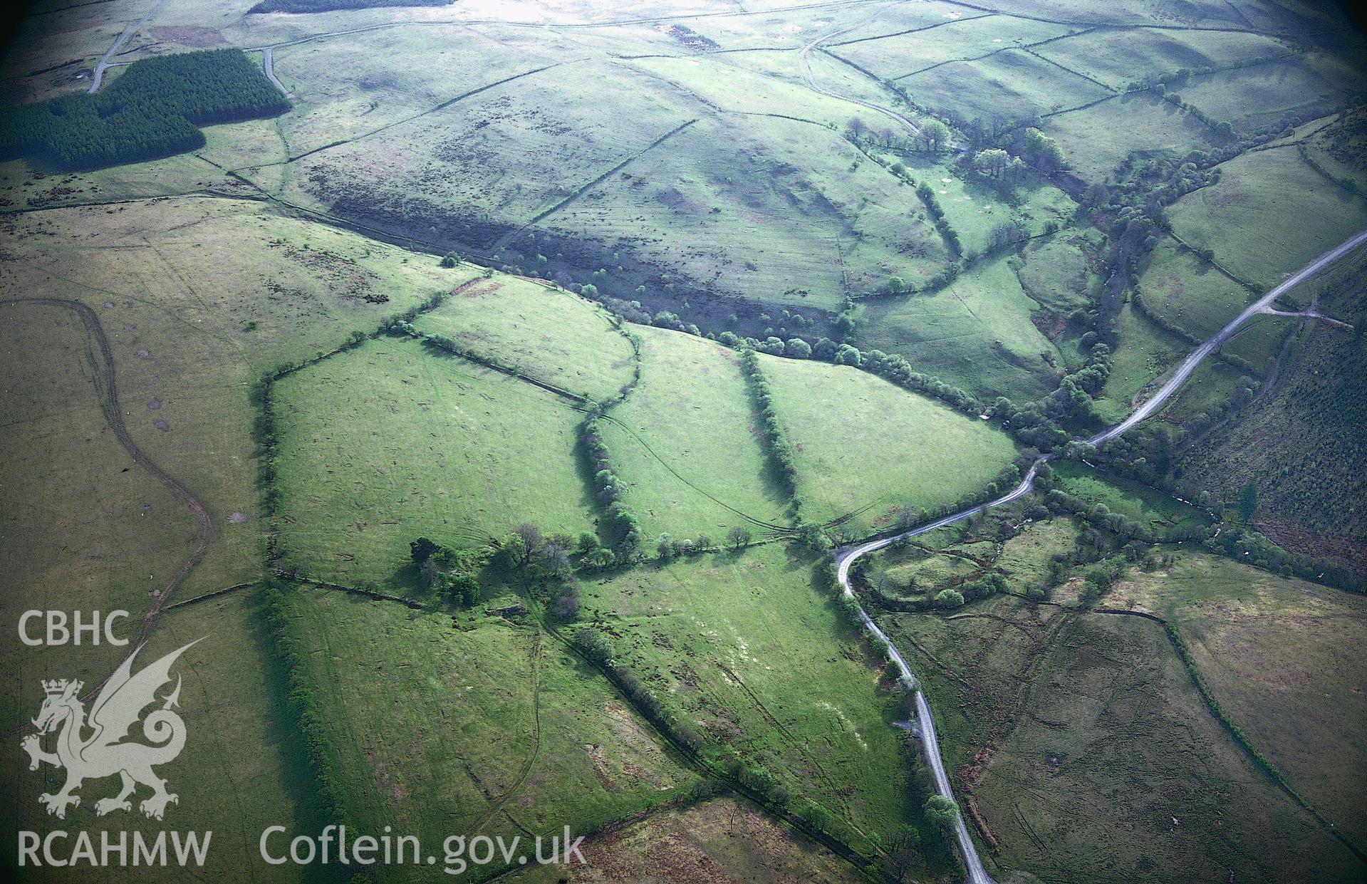 RCAHMW colour slide oblique aerial photograph of Clawdd Brythonig; Clawdd British, Maescar, taken by T.G.Driver on the 03/05/1997