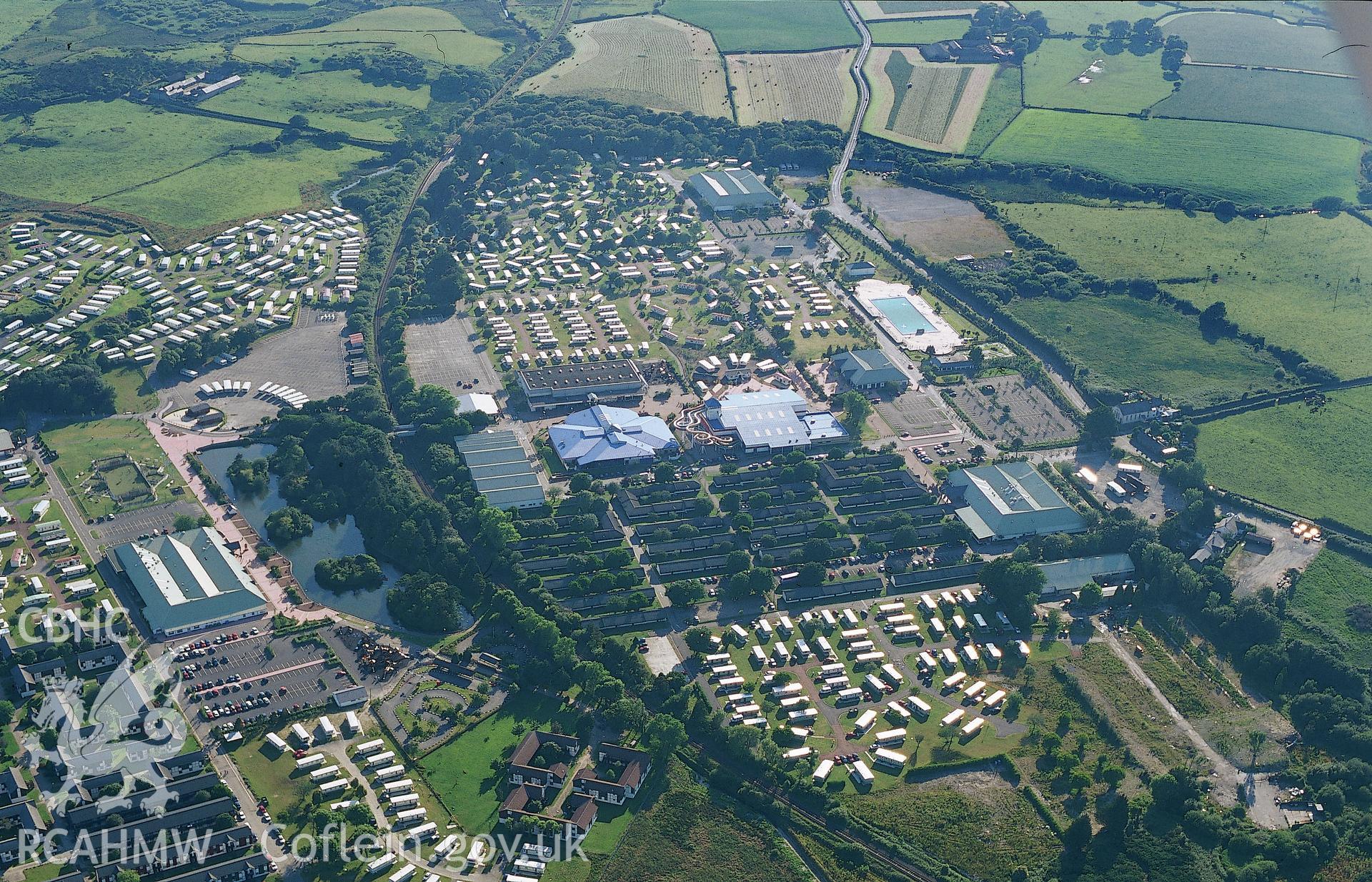 RCAHMW colour slide oblique aerial photograph of Penychain Holiday Camp, Llanstumdwy, taken by T.G.Driver on the 26/06/2000