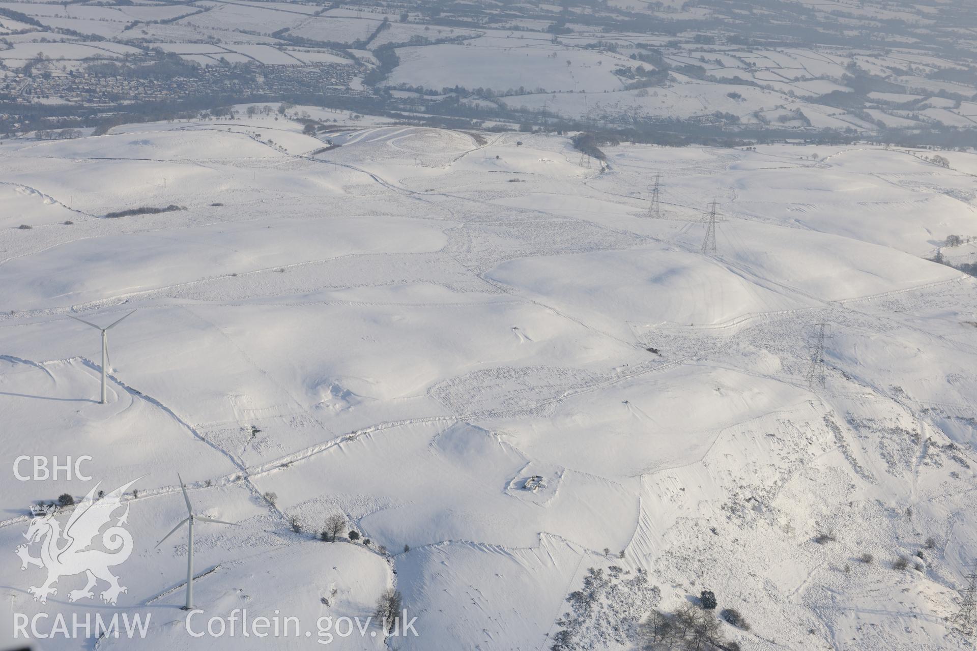 Remains of St. Peter's church, Llanbad, north of Llanharan, Bridgend. Oblique aerial photograph taken during the Royal Commission?s programme of archaeological aerial reconnaissance by Toby Driver on 24th January 2013.