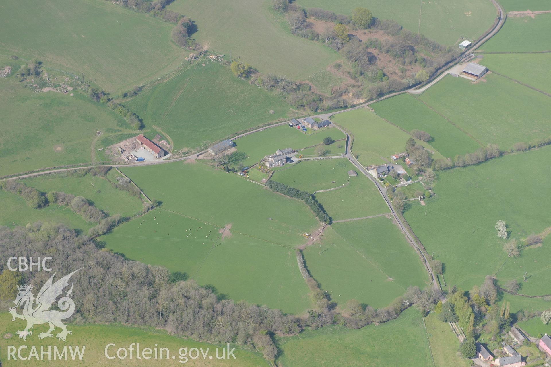 Pen-y-Gaer, Tretower; Greenhill Farmstead, Farmhouse, Barn and Cow-house . Oblique aerial photograph taken during the Royal Commission's programme of archaeological aerial reconnaissance by Toby Driver on 21st April 2015