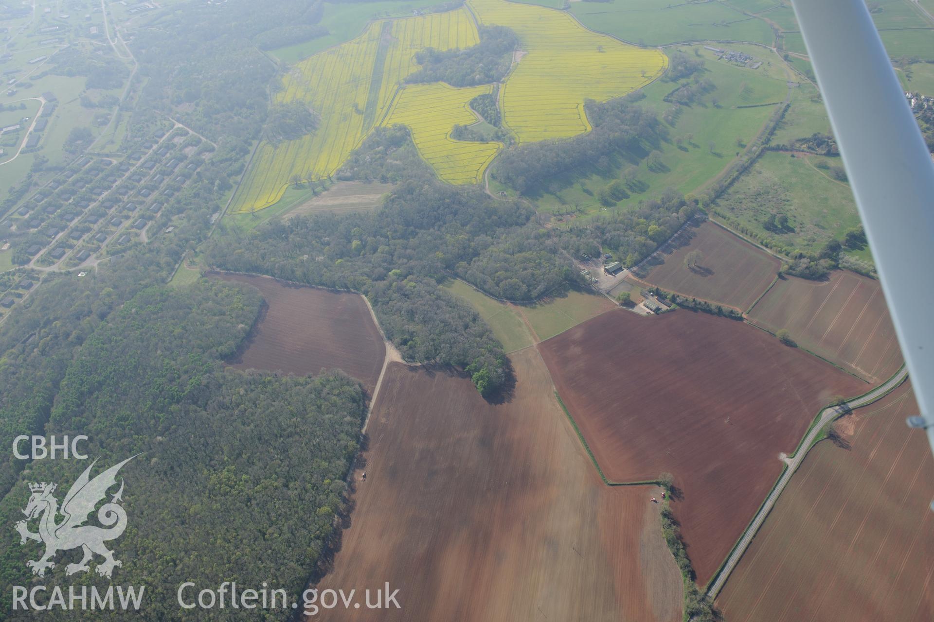 Soilmark enclosures near Nutstalks Wood, Shirenewton Farm and the Royal Naval Propellant Factory at Caerwent. Oblique aerial photograph taken during the Royal Commission's programme of archaeological aerial reconnaissance by Toby Driver on 21st April 2015.