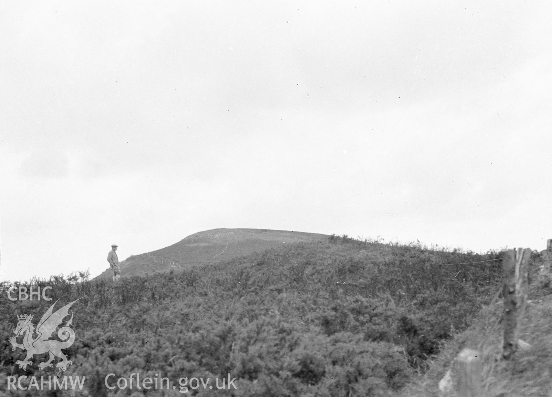 Digital copy of a nitrate negative showing Coed yr Esgob Tumulus.