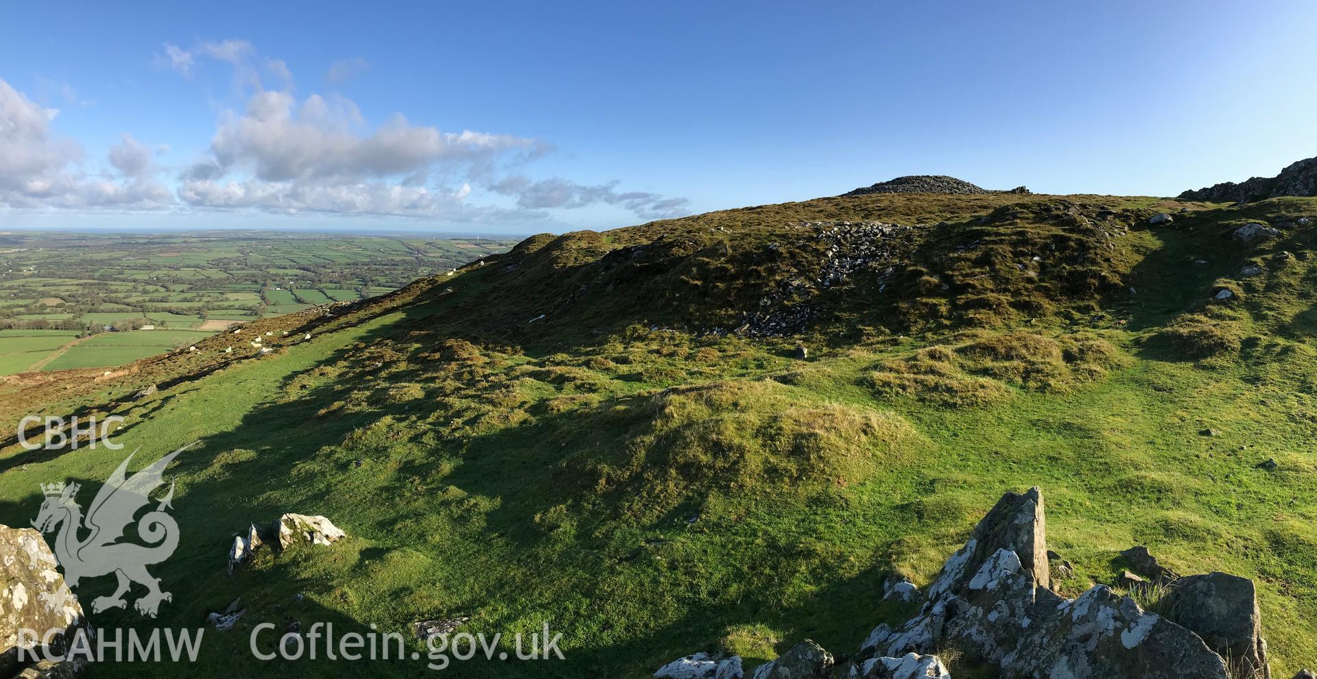 Digital colour photograph showing the west rampart of Foel Drygarn Hillfort, Crymych, taken by Paul Davis on 22nd October 2019.