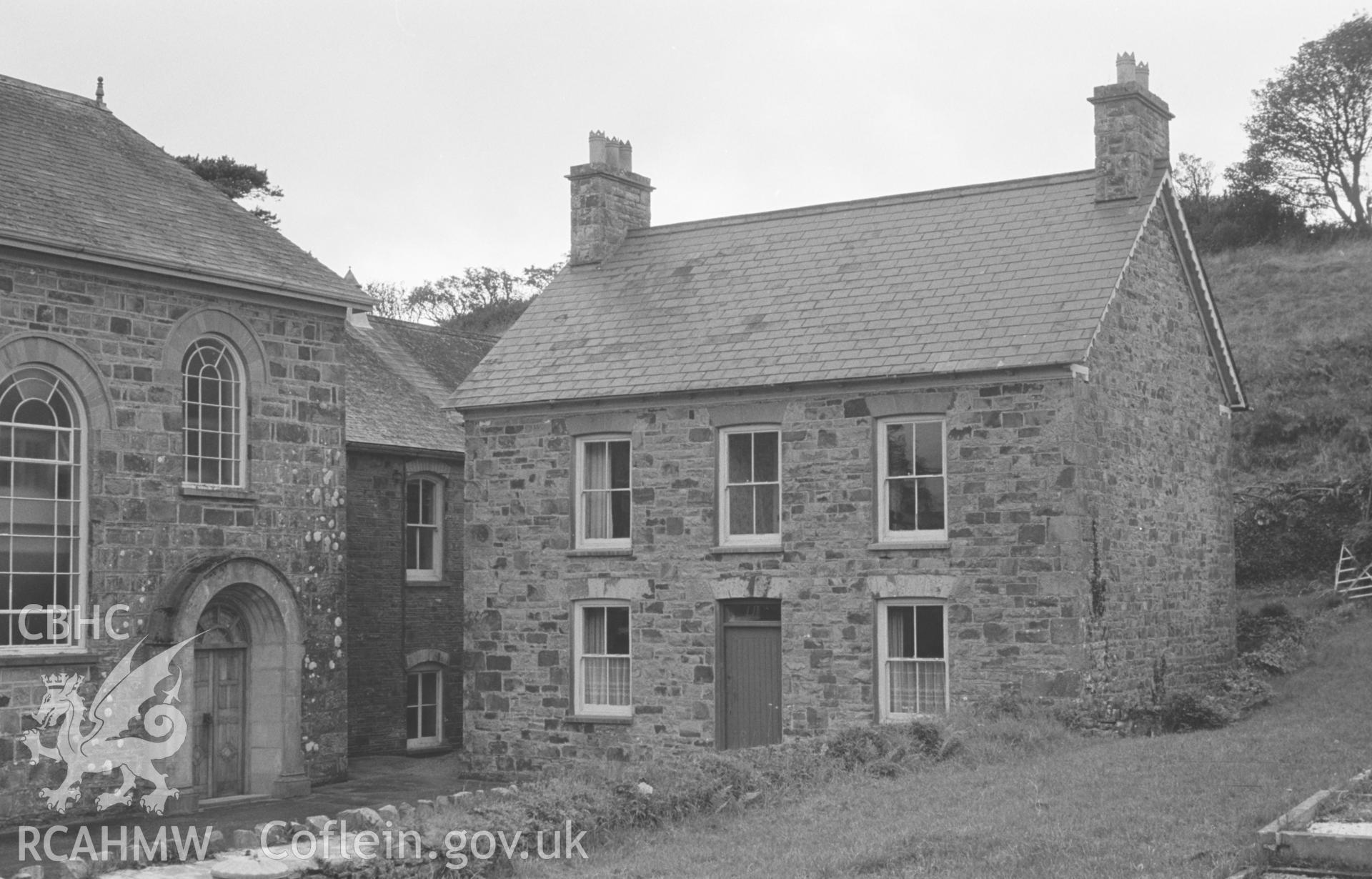 Digital copy of a black and white negative showing exterior view of Penmorfa Welsh Calvinistic Methodist Chapel and chapel house, Penmorfa, Penbryn. Photographed by Arthur O. Chater on 10th September 1966 looking west from Grid Reference SN 3051 5220.