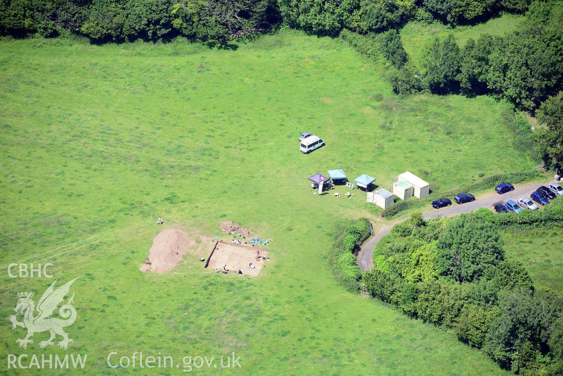 Excavation of Caerau Hillfort, Ely, conducted by Cardiff University. Oblique aerial photograph taken during the Royal Commission's programme of archaeological aerial reconnaissance by Toby Driver on 29th June 2015.