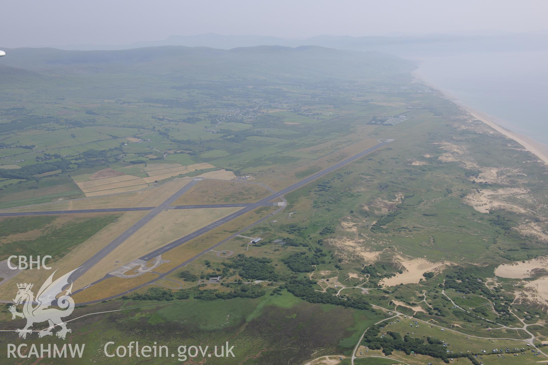 Llanbedr Airfield, south of Harlech. Oblique aerial photograph taken during the Royal Commission?s programme of archaeological aerial reconnaissance by Toby Driver on 12th July 2013.