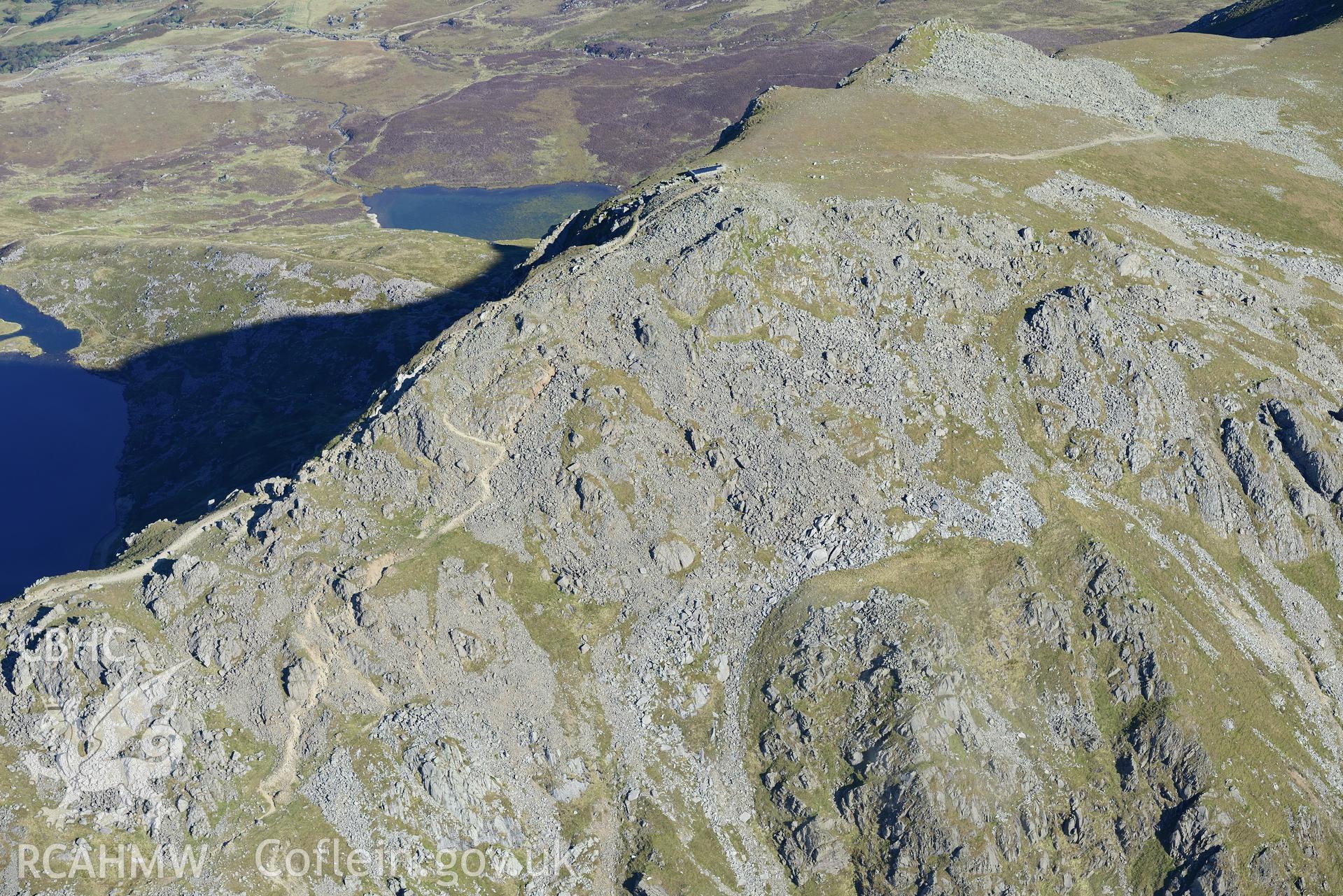 Penygadair - the summit of Cadair Idris. Oblique aerial photograph taken during the Royal Commission's programme of archaeological aerial reconnaissance by Toby Driver on 2nd October 2015.