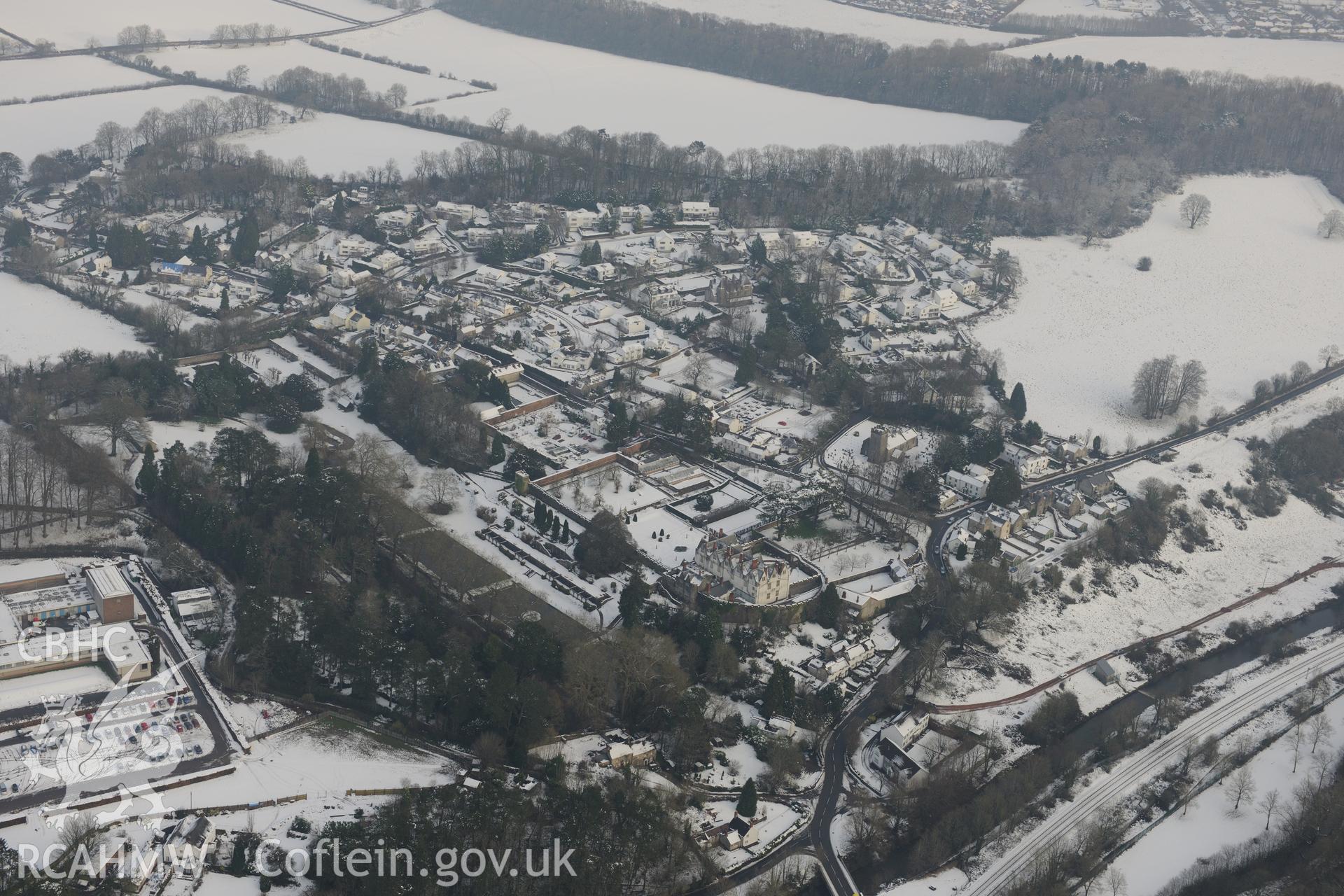 St Fagans Castle; St. Mary's Church; and the main entrance building at St Fagans Mueseum of Welsh Life. Oblique aerial photograph taken during the Royal Commission?s programme of archaeological aerial reconnaissance by Toby Driver on 24th January 2013.