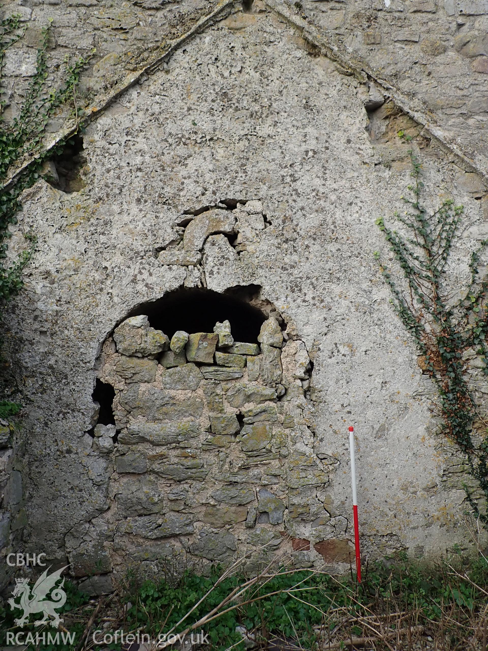 Investigator's photographic survey of the church on Puffin Island or Ynys Seiriol for the CHERISH Project. View of blocked archway on south side of tower giving access to the transept. ? Crown: CHERISH PROJECT 2018. Produced with EU funds through the Ireland Wales Co-operation Programme 2014-2020. All material made freely available through the Open Government Licence.