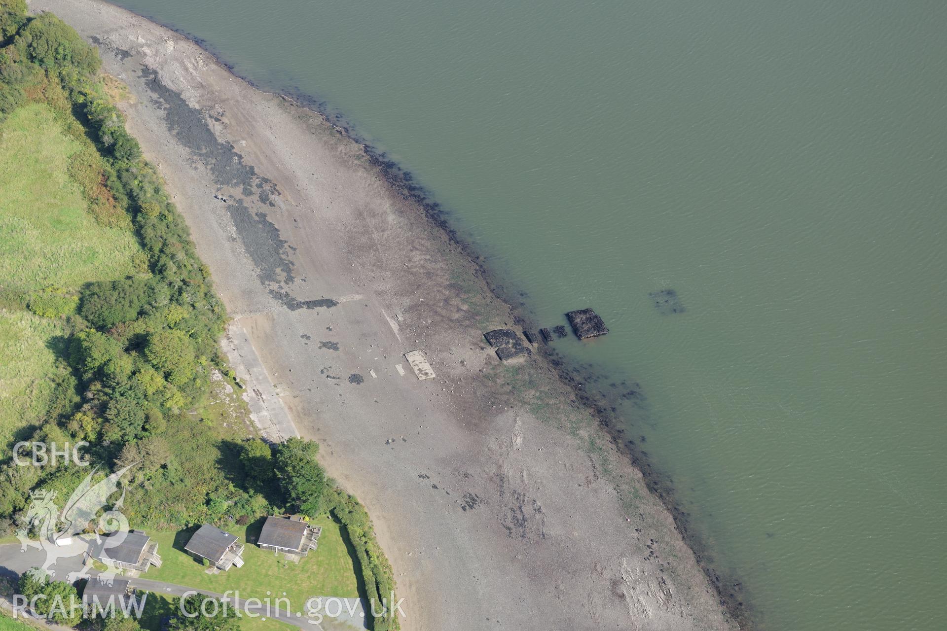 Burton Beach overlord hard (World War II embarkation point and associated structures and buildings), on the banks of the Gleddau estuary, north of Haverford West. Oblique aerial photograph taken during the Royal Commission's programme of archaeological aerial reconnaissance by Toby Driver on 30th September 2015.