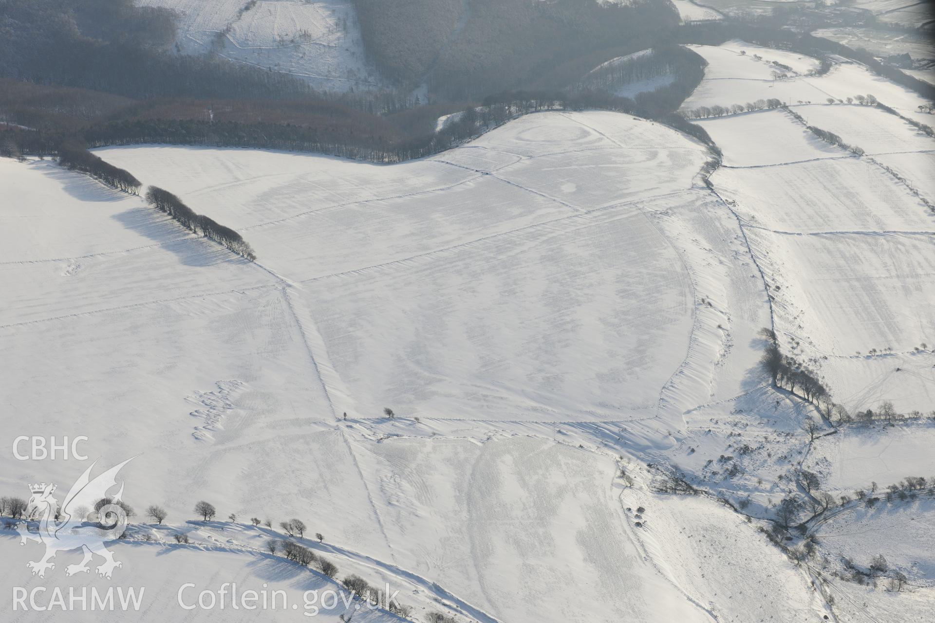 Ton Mawr enclosure, east of Margam, Port Talbot. Oblique aerial photograph taken during the Royal Commission?s programme of archaeological aerial reconnaissance by Toby Driver on 24th January 2013.