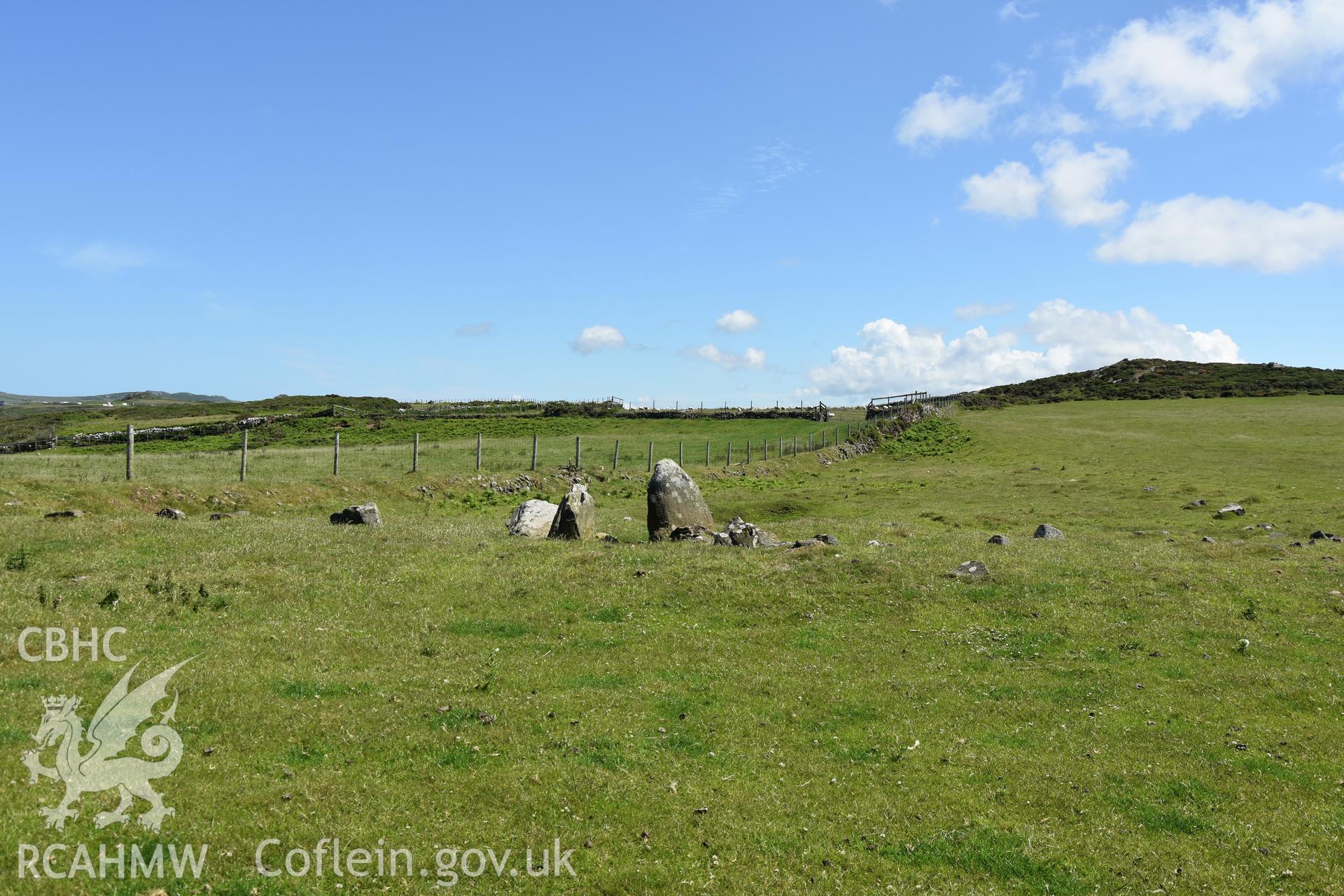 Lower Treginnis chambered tomb.  General view from west showing area of possible former cairn material around the chambered tomb. Investigator?s photographic survey for the CHERISH Project. ? Crown: CHERISH PROJECT 2019. Produced with EU funds through the Ireland Wales Co-operation Programme 2014-2020. All material made freely available through the Open Government Licence.