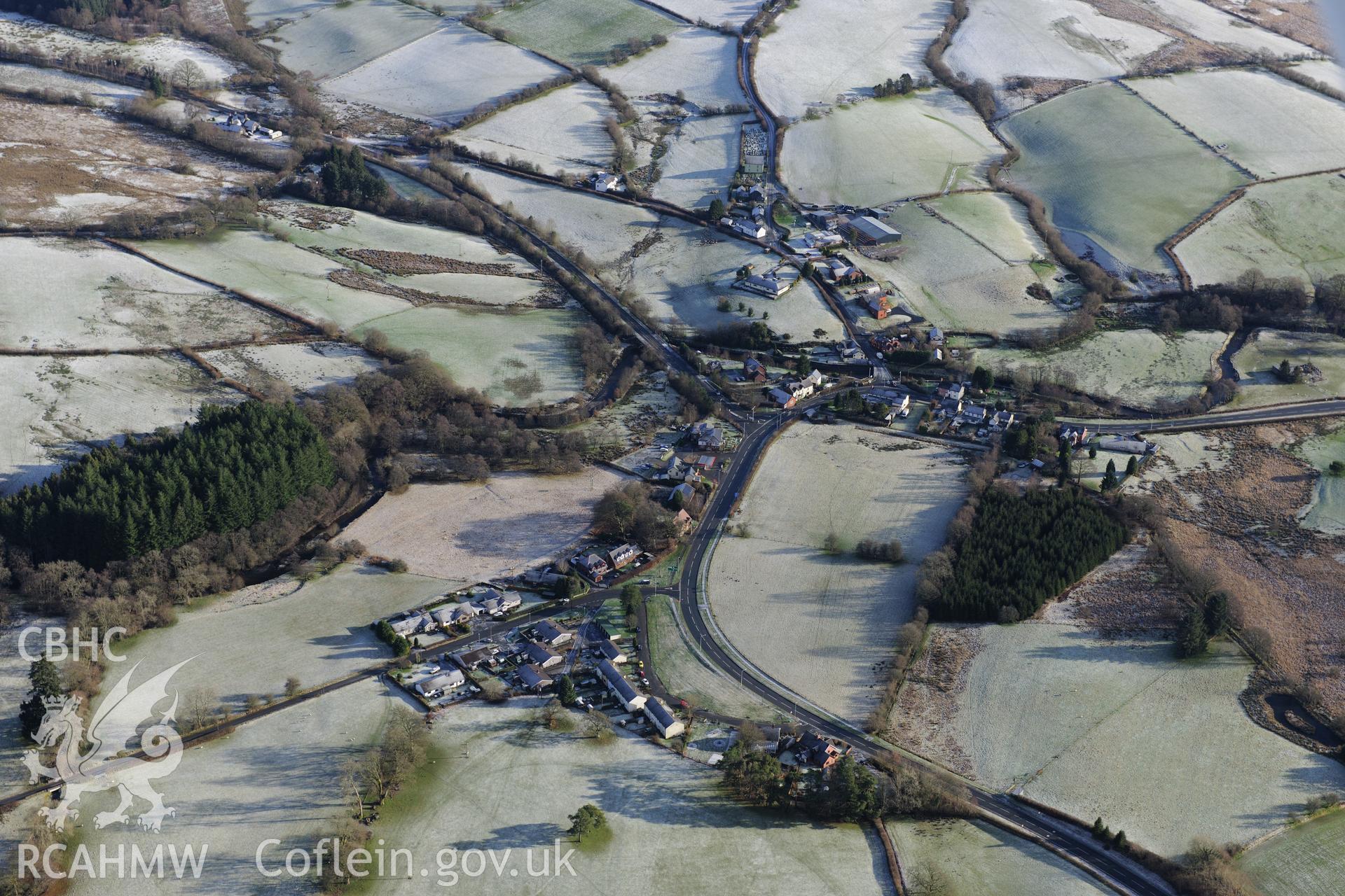 The village of Beulah, west of Builth Wells. Oblique aerial photograph taken during the Royal Commission?s programme of archaeological aerial reconnaissance by Toby Driver on 15th January 2013.