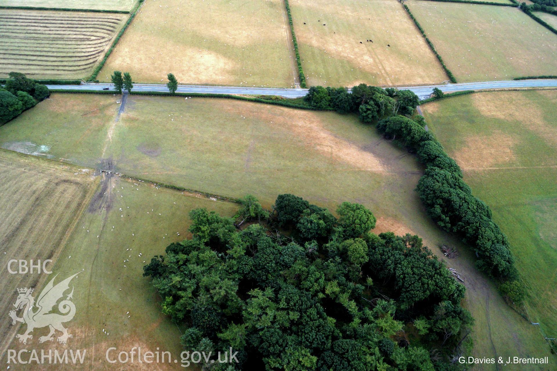 Aerial photograph of Square Barrow Cemetery, Croes Faen, taken by Glyn Davies and Jonathan Brentnall 15/07/2018, under drought conditions. This photograph has been modified to enhance the visibility of the archaeology. Original photograph: BDC_04_01_02.