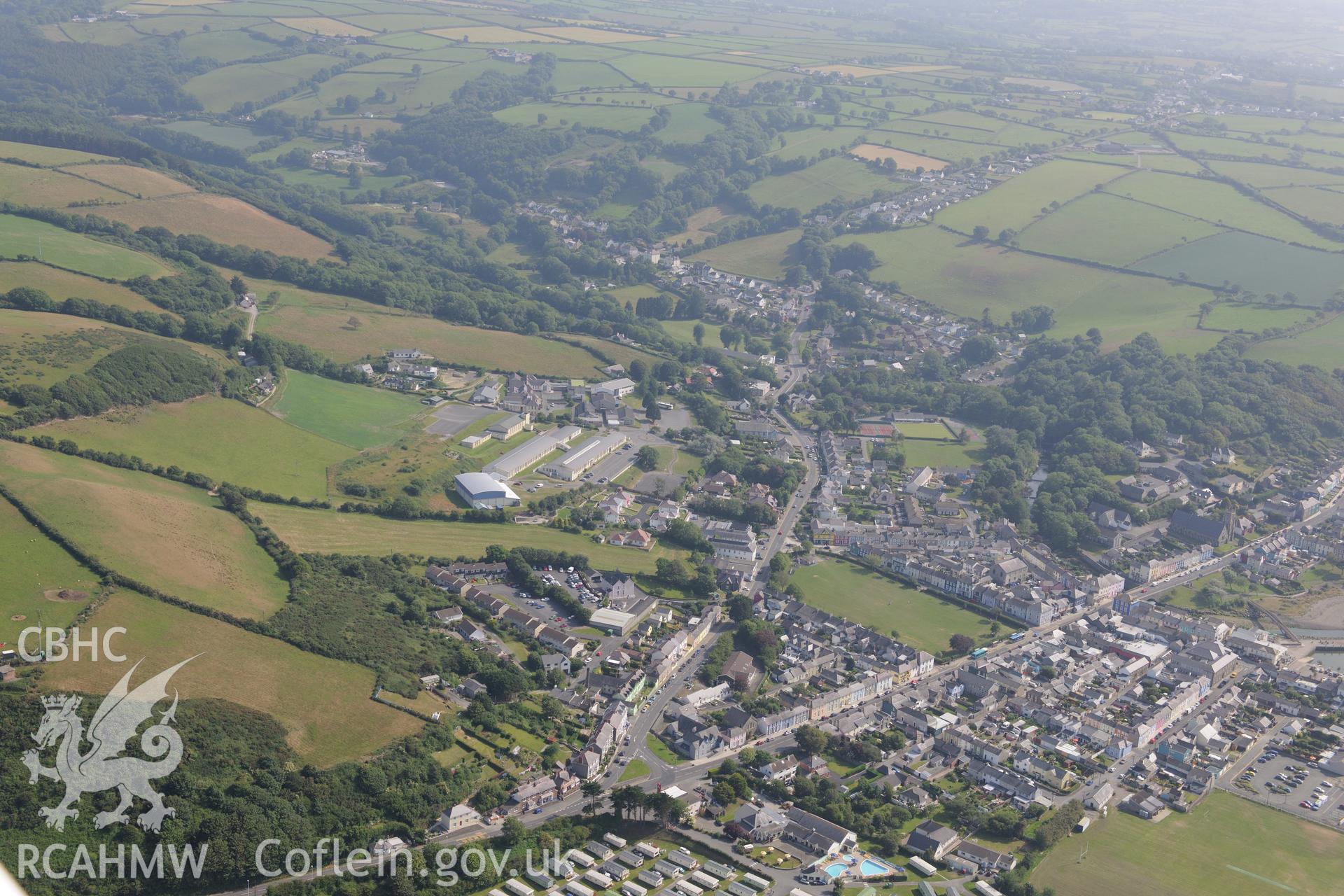 Ysgol Gyfun Aberaeron and the town of Aberaeron. Oblique aerial photograph taken during the Royal Commission?s programme of archaeological aerial reconnaissance by Toby Driver on 12th July 2013.