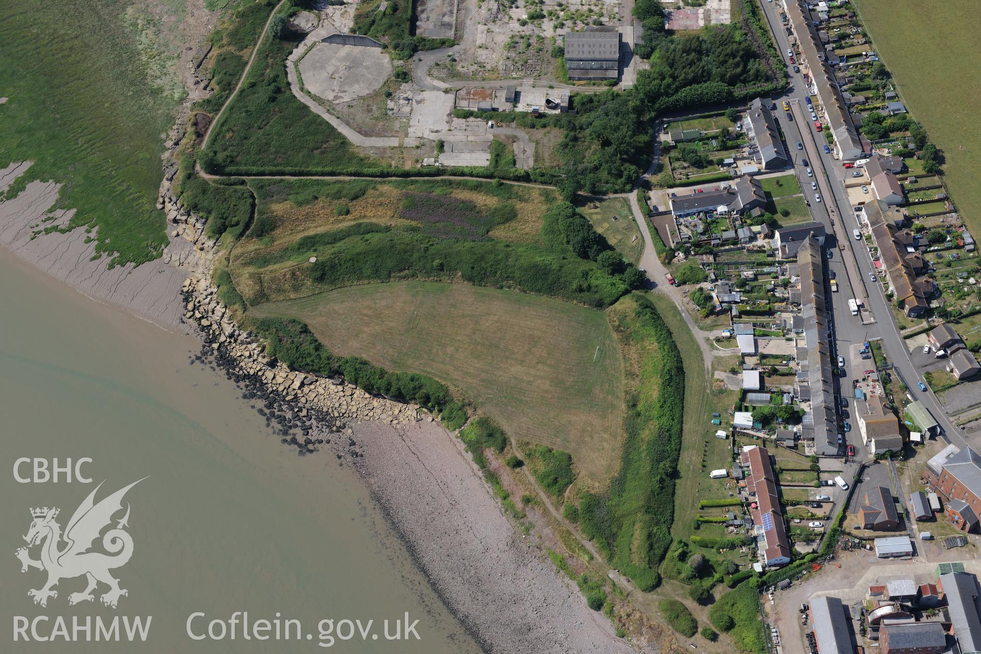 Sudbrook village, east of Caldicot, with Sudbrook fort, pumping station & the remains of Sudbrook medieval village. Oblique aerial photograph taken during Royal Commission?s programme of archaeological aerial reconnaissance by Toby Driver, 1st August 2013.