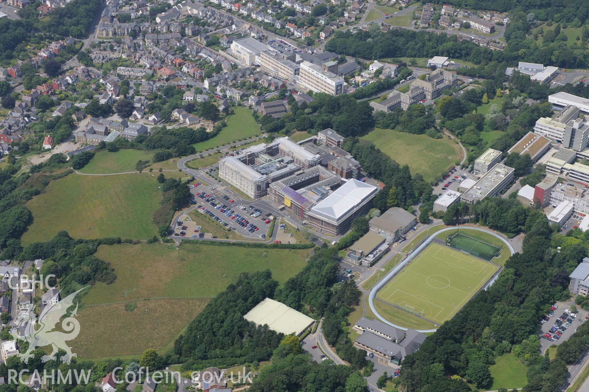 The National Library of Wales, Pantycelyn Hall and Bronglais Hospital, Aberystwyth. Oblique aerial photograph taken during the Royal Commission?s programme of archaeological aerial reconnaissance by Toby Driver on 12th July 2013.