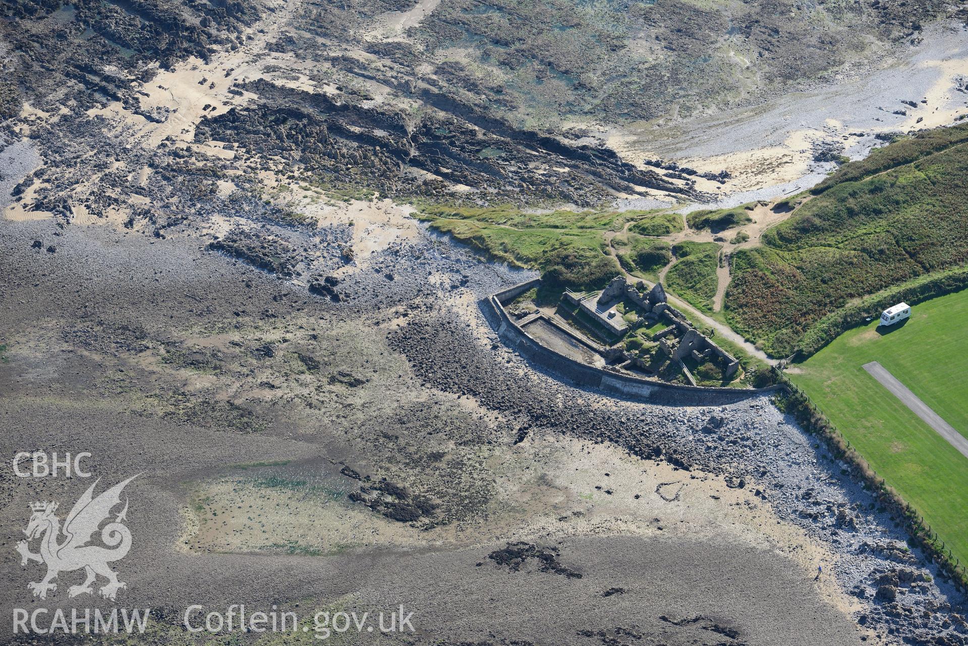 Port Eynon salt house, on the southern shores of the Gower Peninsula at Port Eynon Bay. Oblique aerial photograph taken during the Royal Commission's programme of archaeological aerial reconnaissance by Toby Driver on 30th September 2015.