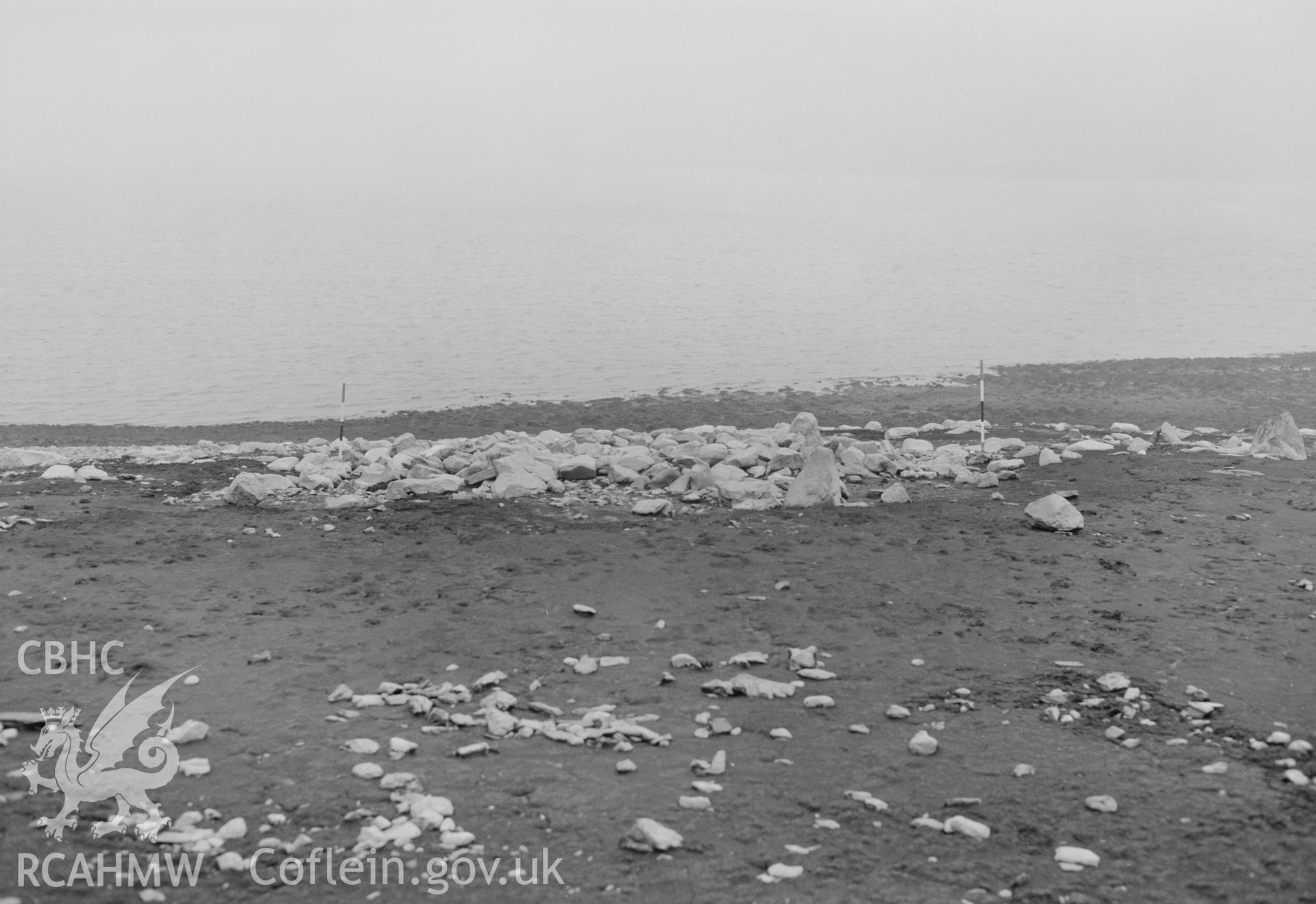 Digital copy of a black and white nitrate negative showing a view of Aber Camddwr cairn, taken by RCAHMW, undated.