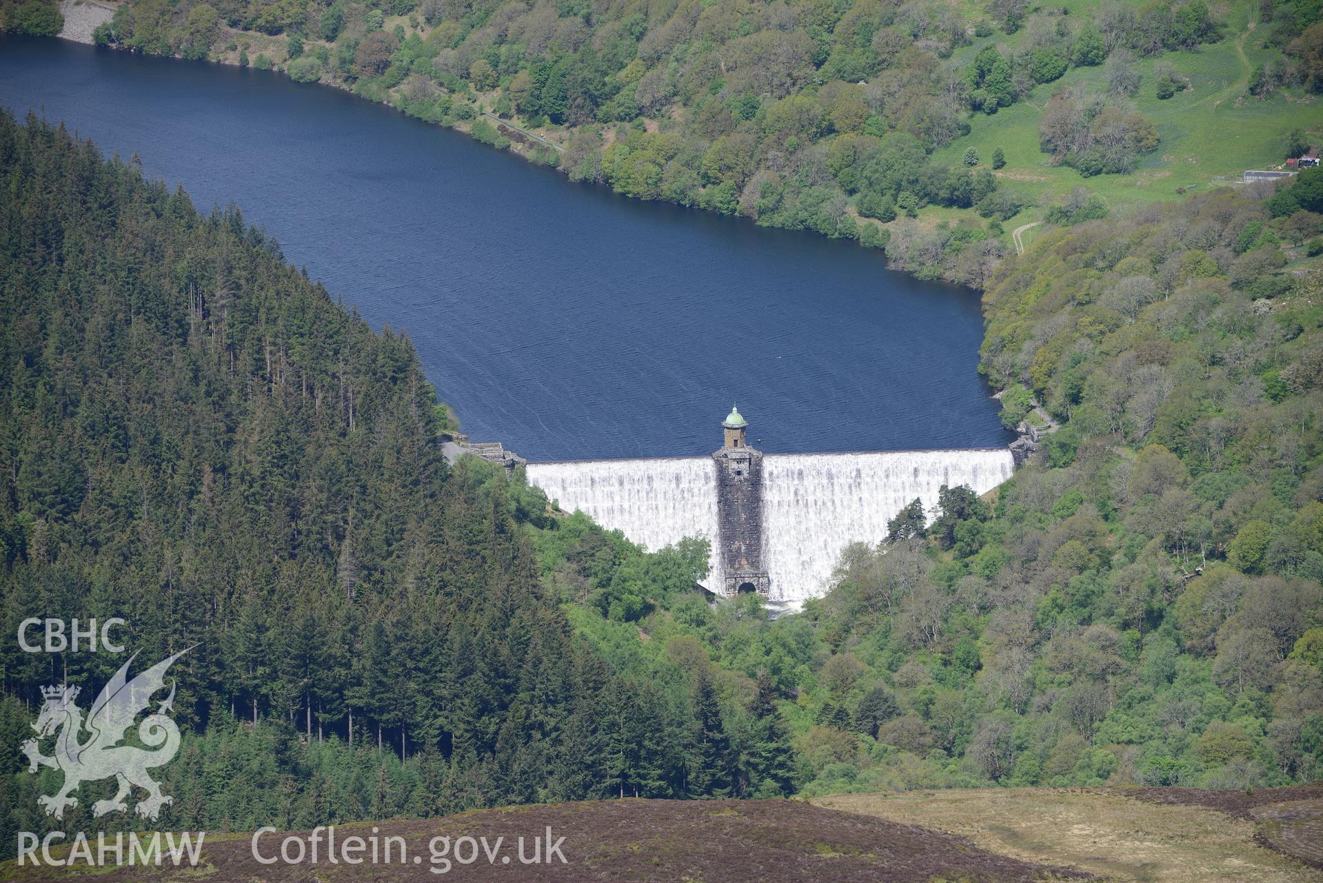 Pen-y-Garreg reservoir, dam and valve tower. Oblique aerial photograph taken during the Royal Commission's programme of archaeological aerial reconnaissance by Toby Driver on 3rd June 2015.