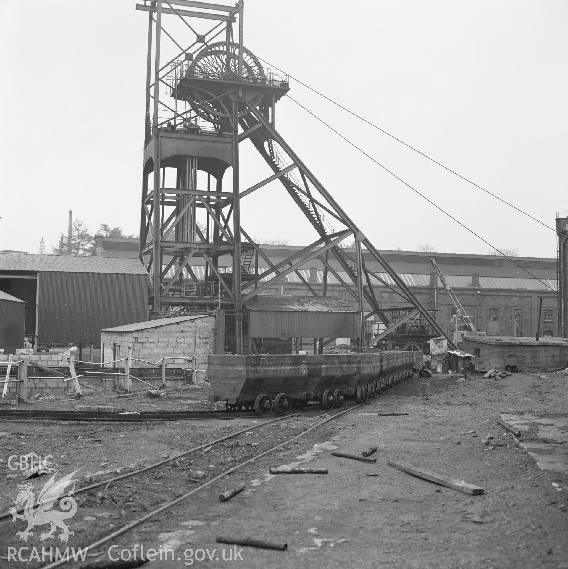 Digital copy of an acetate negative showing trams of coal on the down cast shaft at Penallta Colliery, from the John Cornwell Collection.