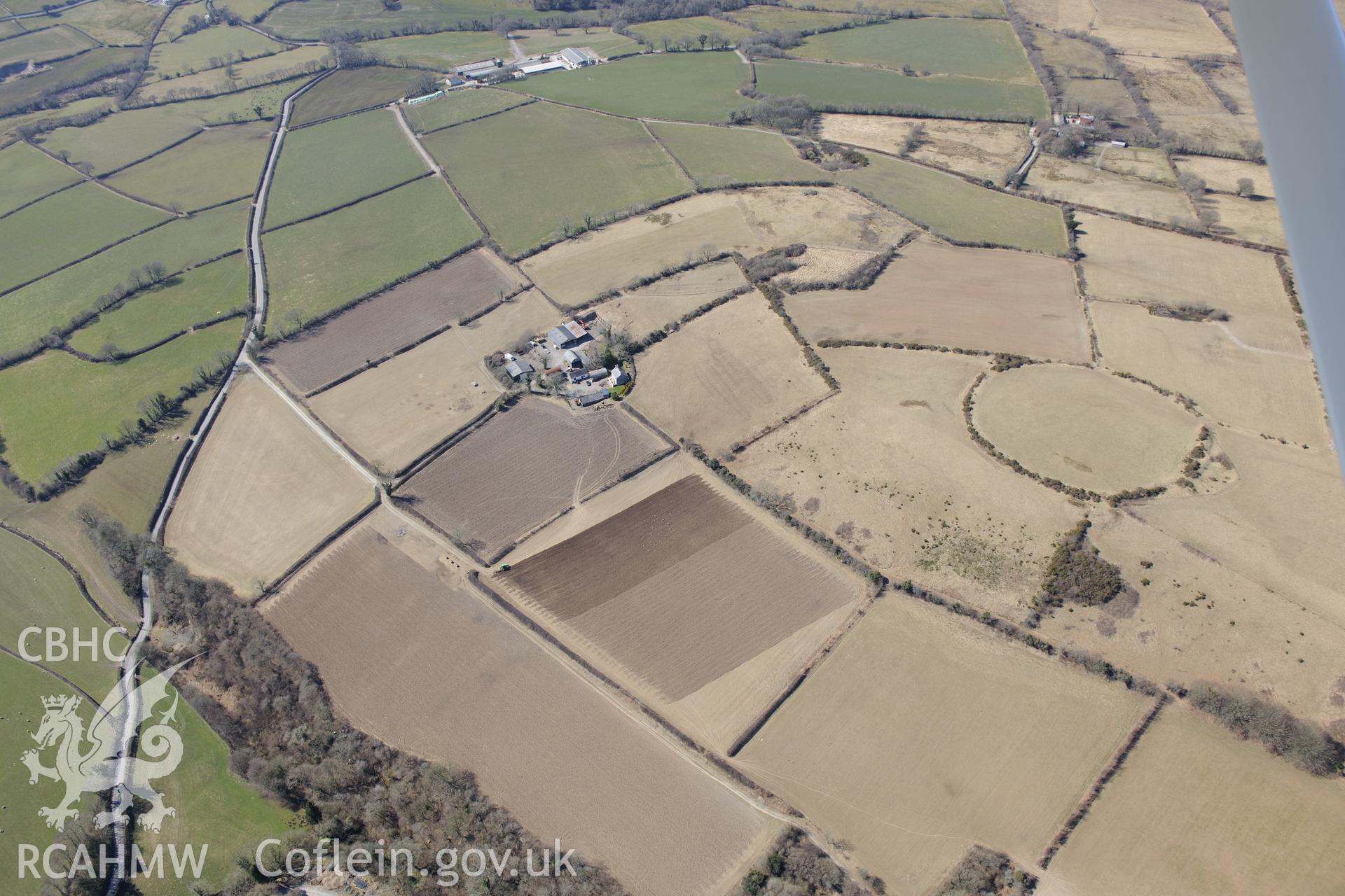 Cribbyn Clottas hillfort, Cribyn, north west of Lampeter. Oblique aerial photograph taken during the Royal Commission's programme of archaeological aerial reconnaissance by Toby Driver on 2nd April 2013.