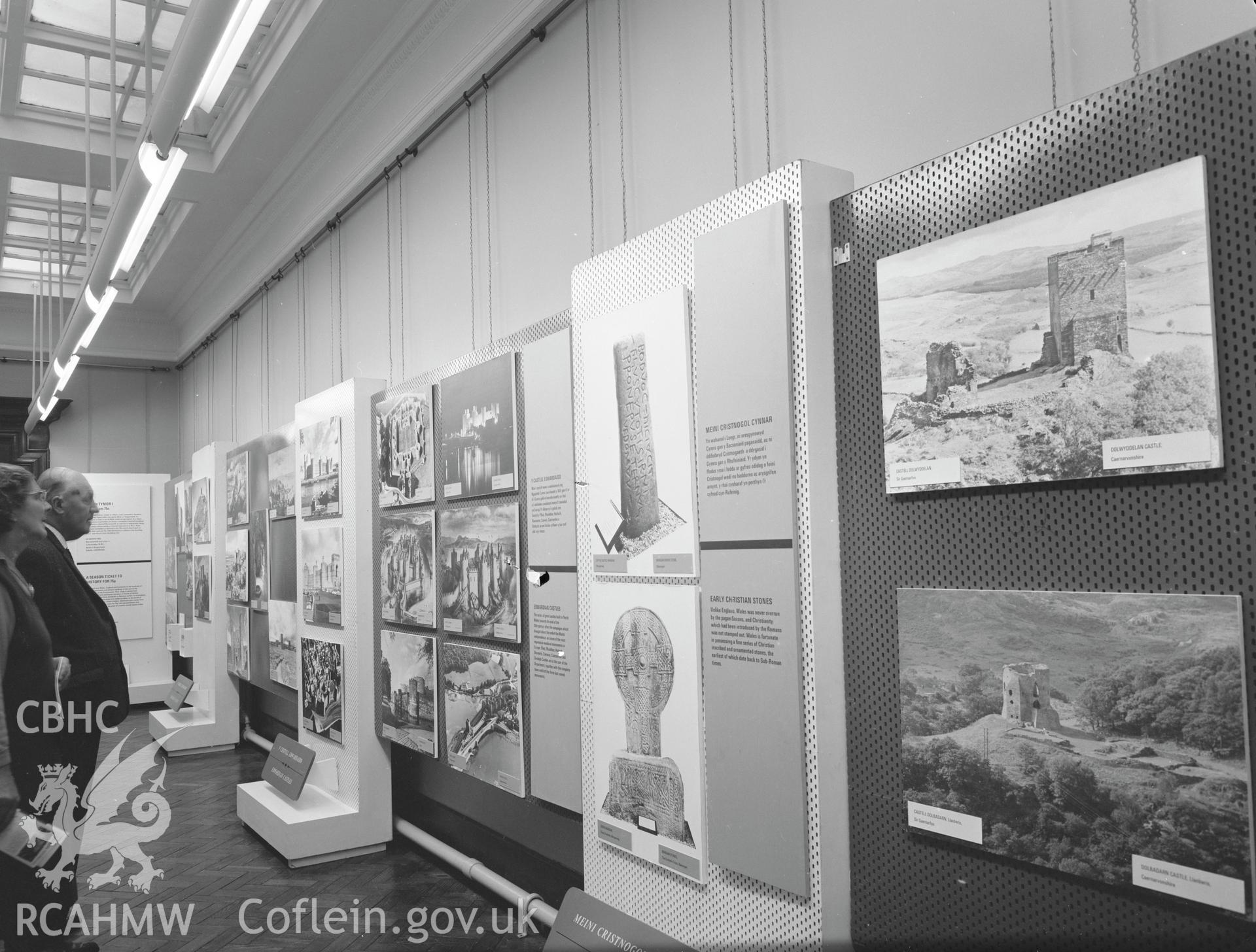 Digital copy of a black and white negative showing Ancient Monuments Exhibition, Welsh Tourer, Vivian Art Gallery, Swansea. From Cadw Monuments in Care Collection.