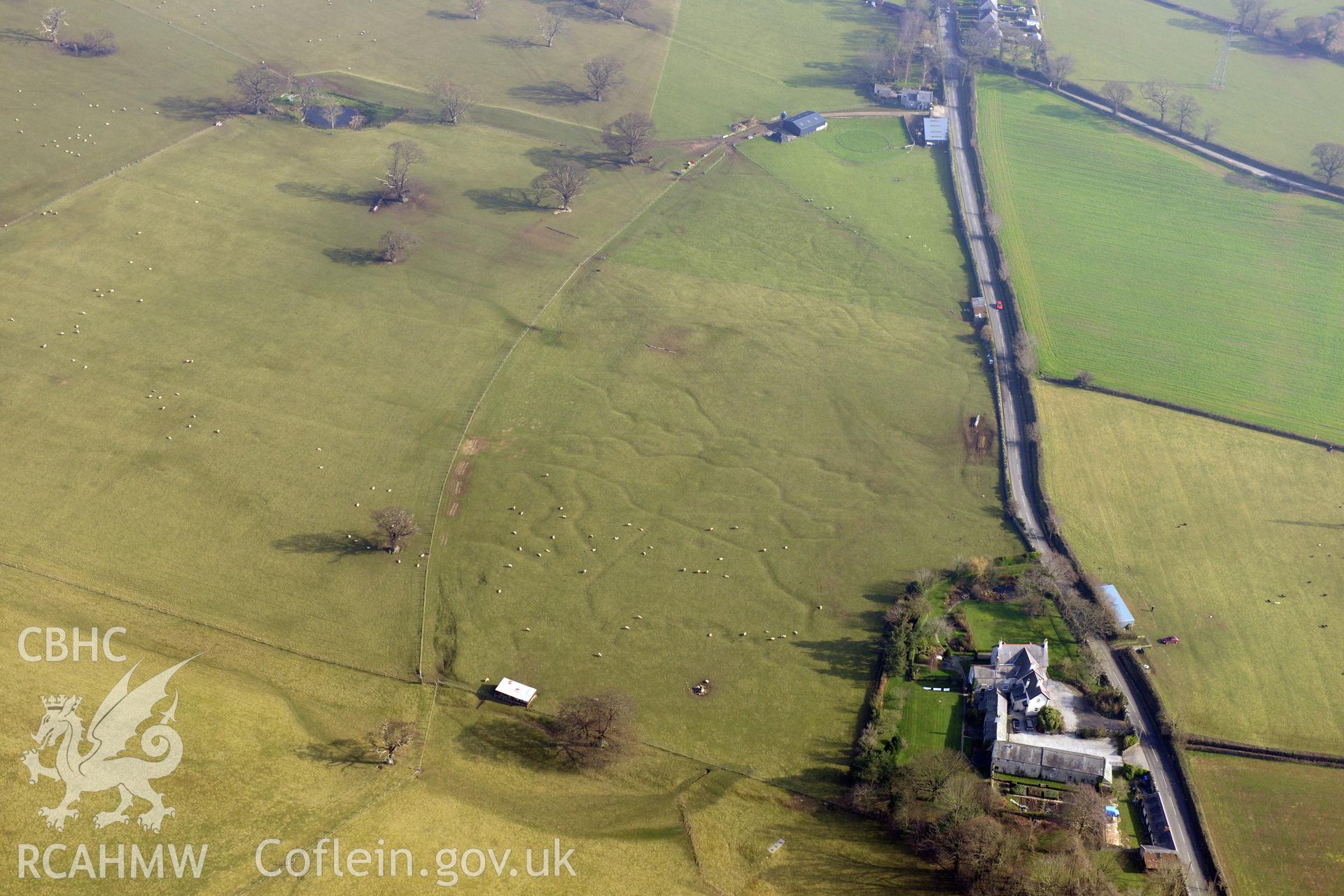 The south-eastern group of Bodelwyddan Park army practise trenches, at Bryn-Celyn, west of St. Asaph. Oblique aerial photograph taken during the Royal Commission?s programme of archaeological aerial reconnaissance by Toby Driver on 28th February 2013.