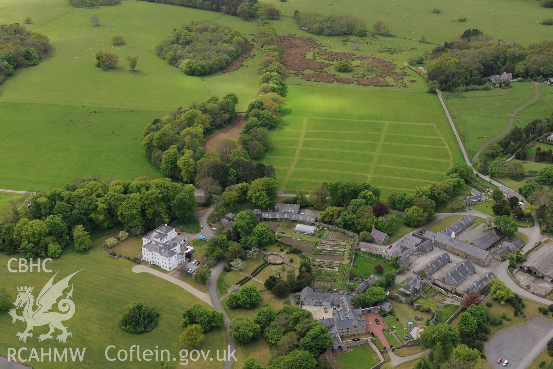 Vaynol Old Hall, Vaynor New Hall and associated farm, farmyard range, and garden, Capel y Graig, Bangor. Oblique aerial photograph taken during the Royal Commission?s programme of archaeological aerial reconnaissance by Toby Driver on 22nd May 2013.