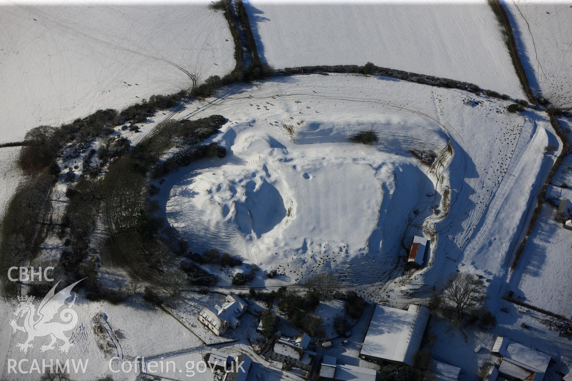 Motte and bailey castle at Painscastle, south east of Builth Wells. Oblique aerial photograph taken during the Royal Commission?s programme of archaeological aerial reconnaissance by Toby Driver on 15th January 2013.