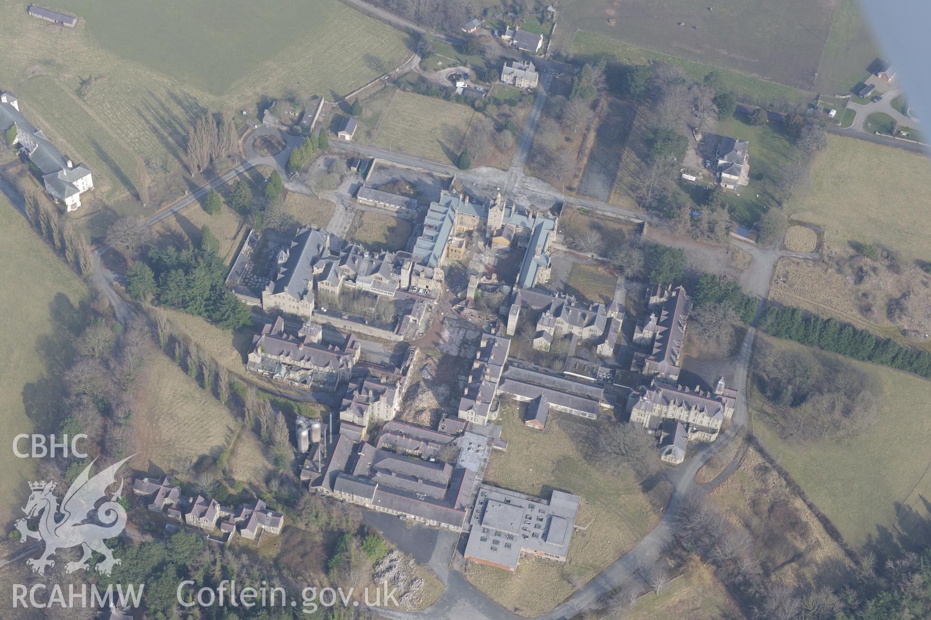 The North Wales Counties Hospital, Denbigh. Oblique aerial photograph taken during the Royal Commission?s programme of archaeological aerial reconnaissance by Toby Driver on 28th February 2013.