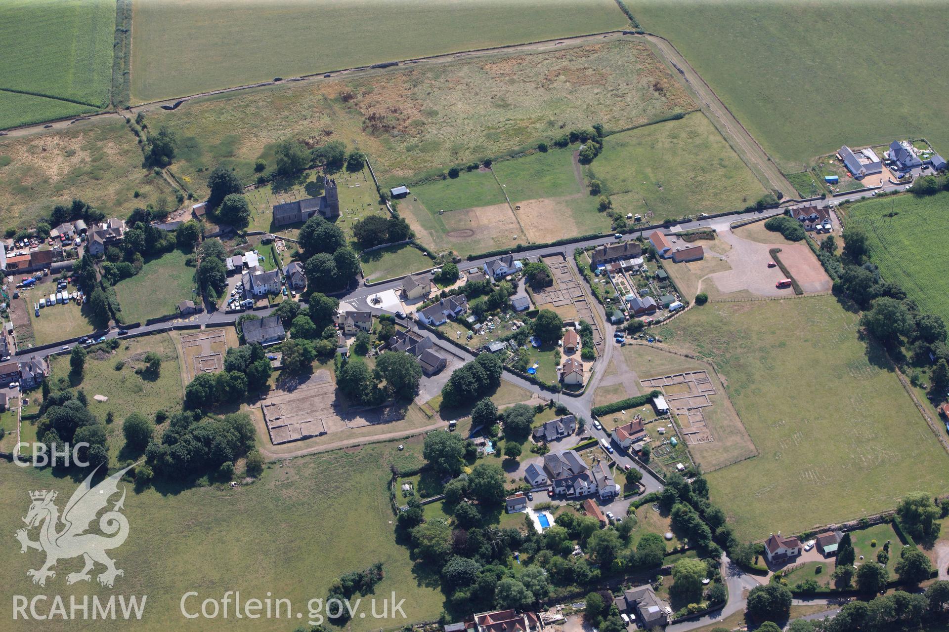 St. Stephen's church, Roman Amphitheatre, Roman Temple and Venta Silurum (Caerwent Roman City), Caerwent, near Chepstow. Oblique aerial photograph taken during the RCAHMW?s programme of archaeological aerial reconnaissance by Toby Driver, 1st August 2013.