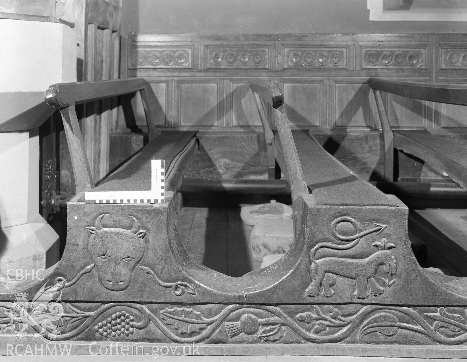 Digital copy of a black and white negative showing carved wooden pews at Rhug Chapel, taken by Department of Environment, 1976.