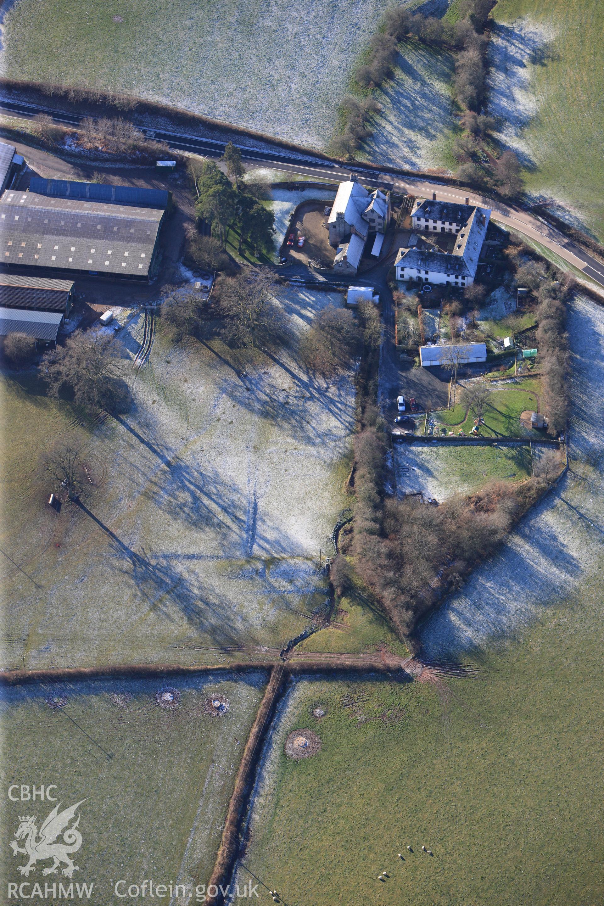 Trebarries mansion with its associated gardens and stable block, north west of Talgarth, Breconshire. Oblique aerial photograph taken during the Royal Commission?s programme of archaeological aerial reconnaissance by Toby Driver on 15th January 2013.