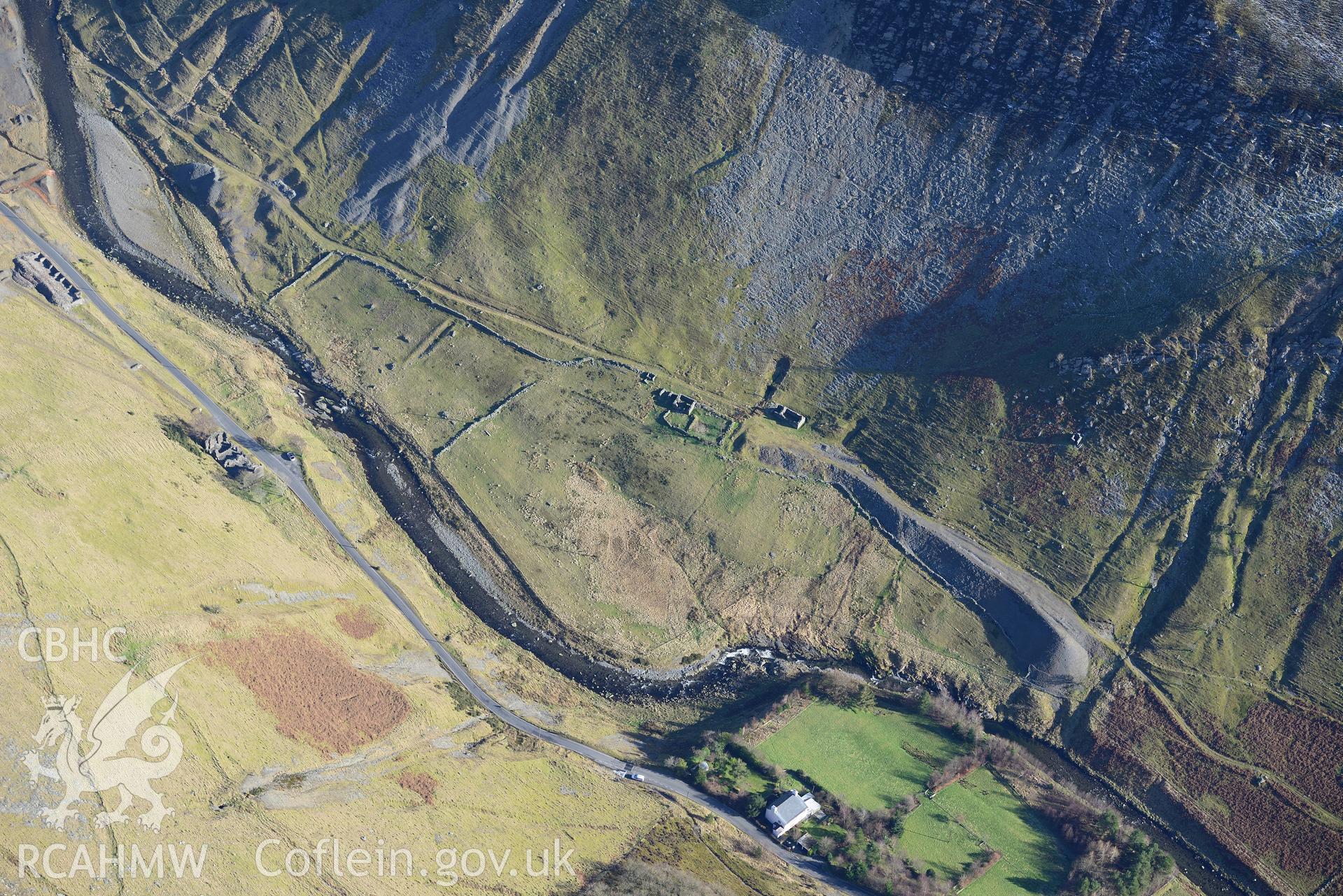 Henbarc mine office,cottage, dwelling & pigsty;Nevill Place miners' cottages; Tanychwarel & Old Place barracks at Cwmystwyth Lead Mine. Oblique aerial photograph taken during RCAHMW?s programme of archaeological aerial reconnaissance by Dr Driver,4/2/2015